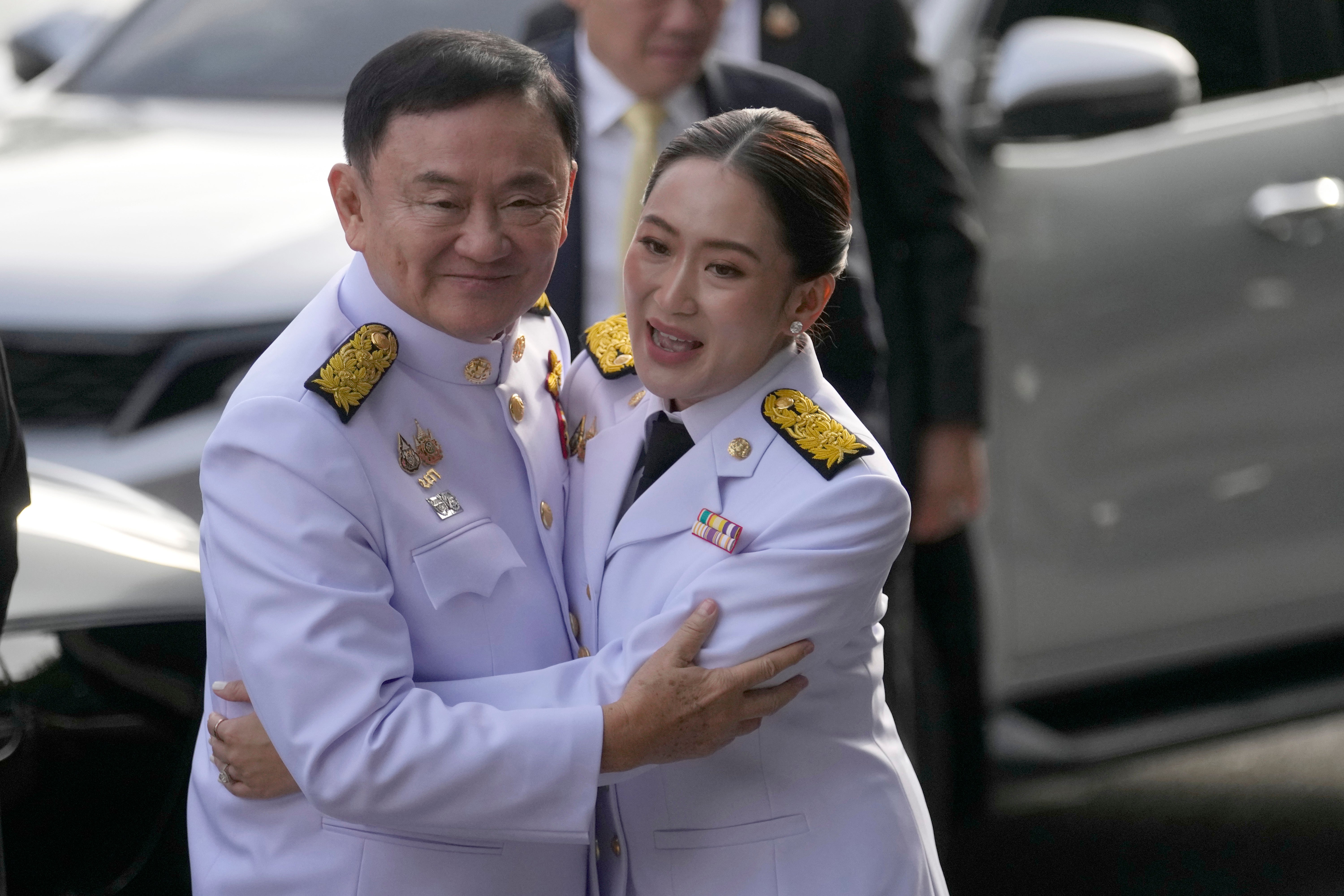 File Thailand's former PM Thaksin Shinawatra, left, hugs his daughter and newly elected leader Paetongtarn Shinawatra before the royal endorsement ceremony appointing Paetongtarn as Thailand's new prime minister at Pheu Thai party headquarters in Bangkok, Thailand, 18 August 2024