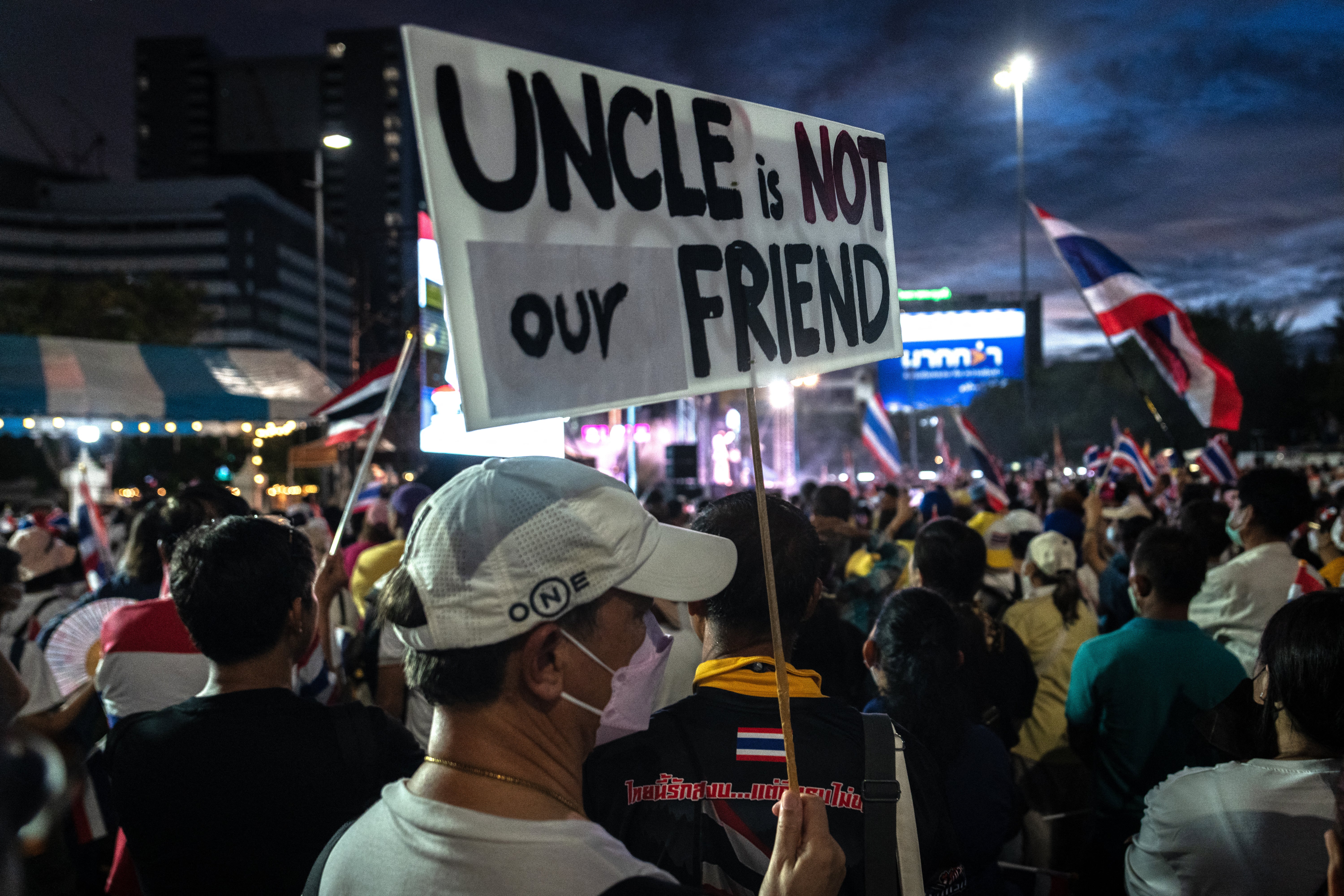 Anti-government protesters rally to demand the removal of Shinawatra in Bangkok in June