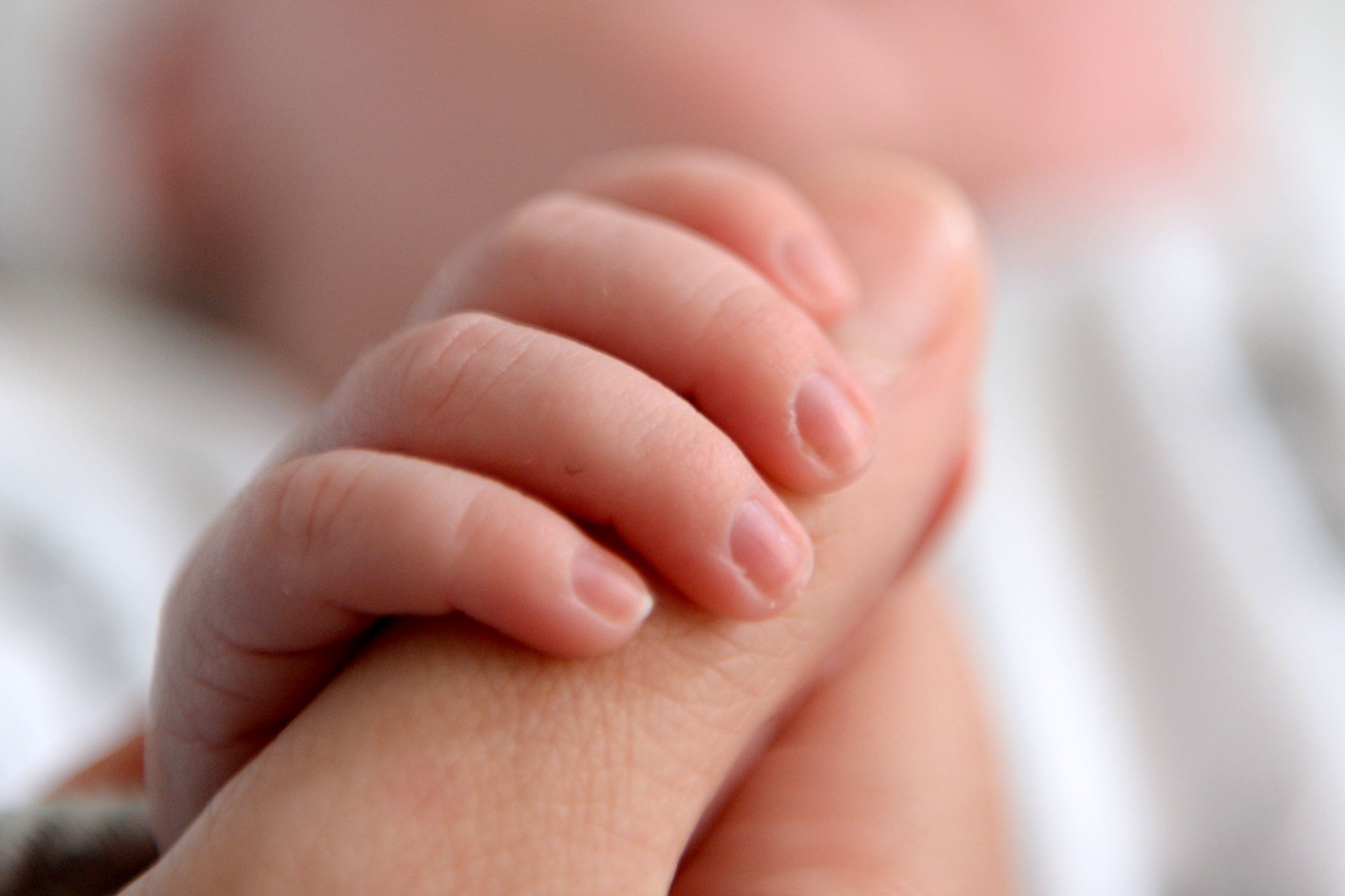 Ministers have launched a review of parental leave and pay (Andrew Matthews/PA)