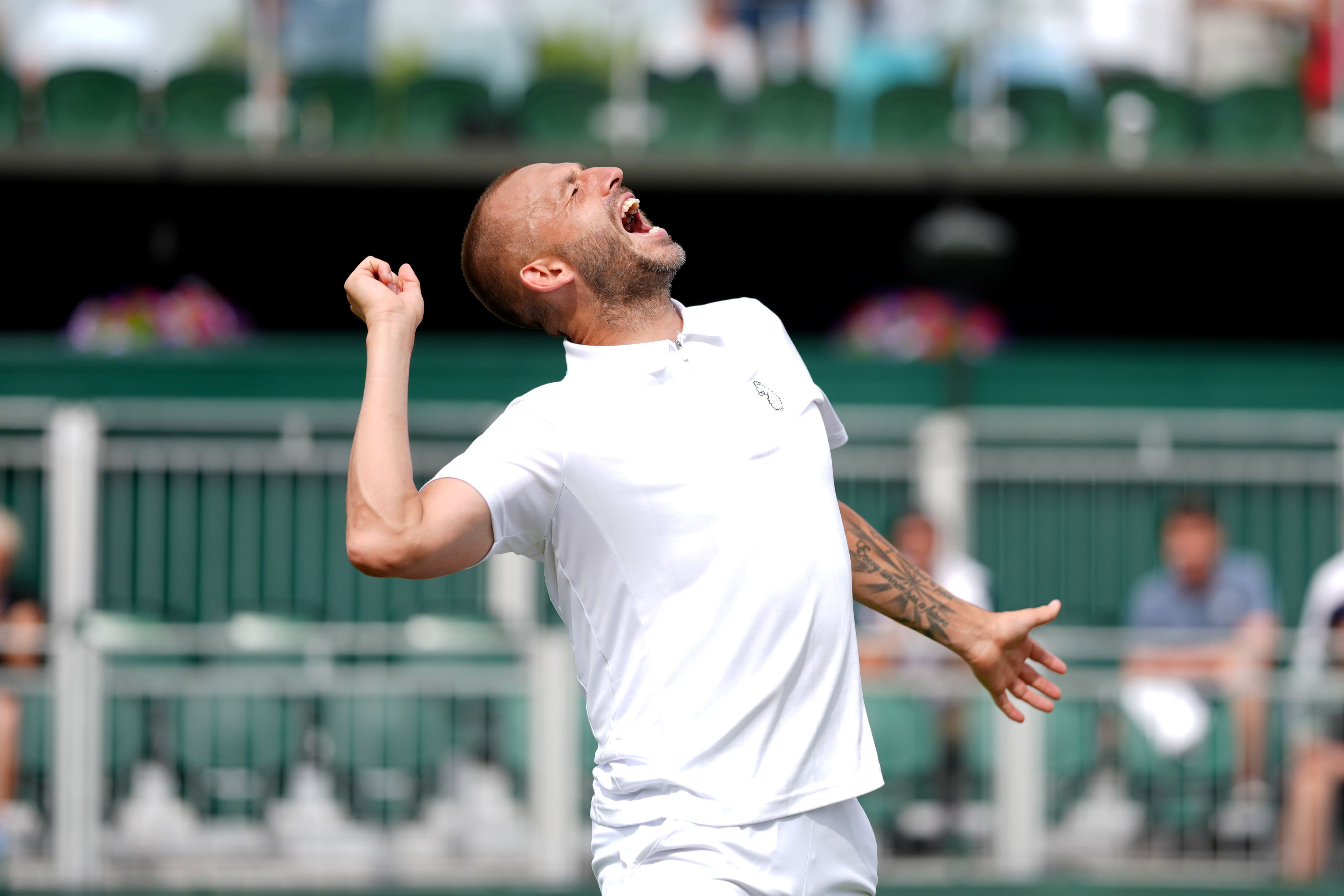Dan Evans celebrates beating Jay Clarke (John Walton/PA)