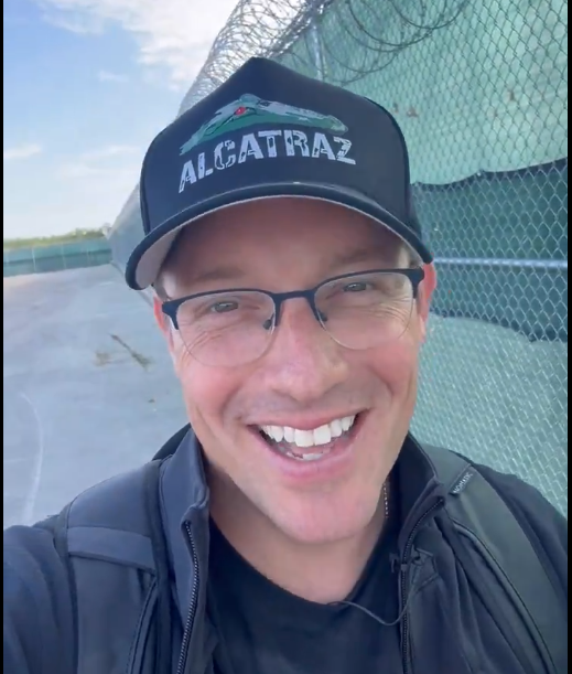 A screenshot from Benny Johnson's promotional clip for the "official Alligator Alcatraz merch" that the Florida GOP is currently selling.
