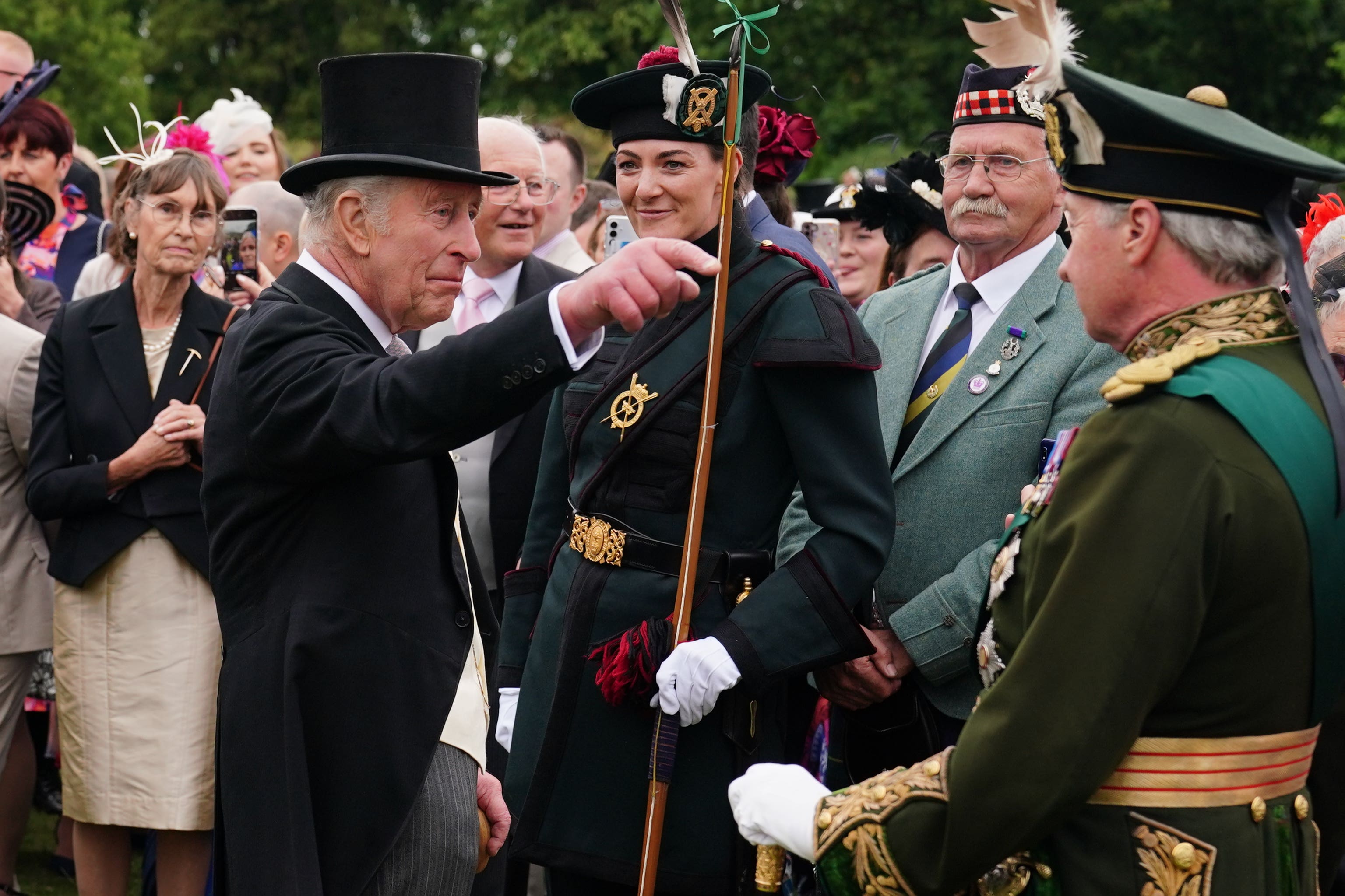 The King with Lady Katherine Douglas of the Royal Company of Archers, the King’s official bodyguard in Scotland (Jane Barlow/PA)