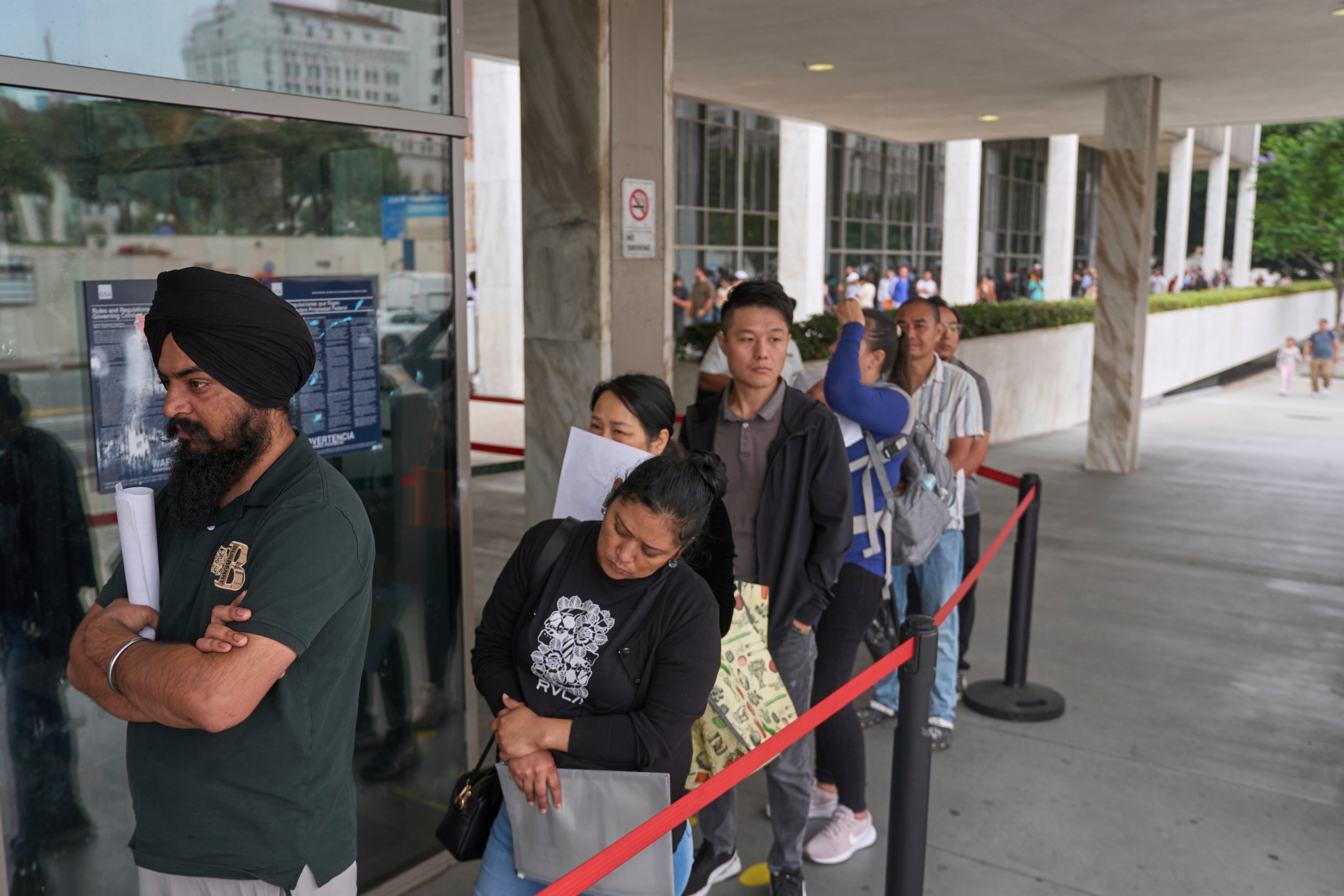 A day outside an LA detention center shows profound impact of ICE raids on families