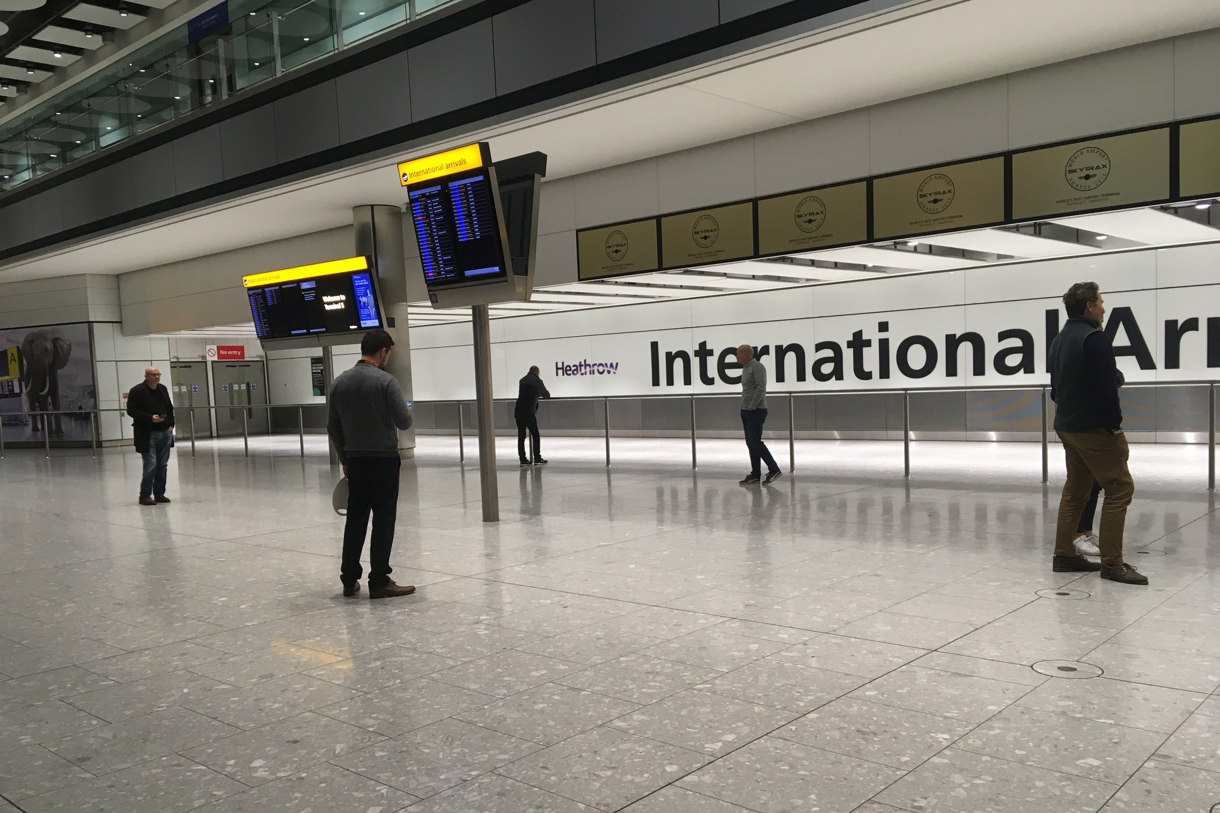 The empty arrivals concourse at Terminal 5 of Heathrow Airport (Heather Clifton/PA)