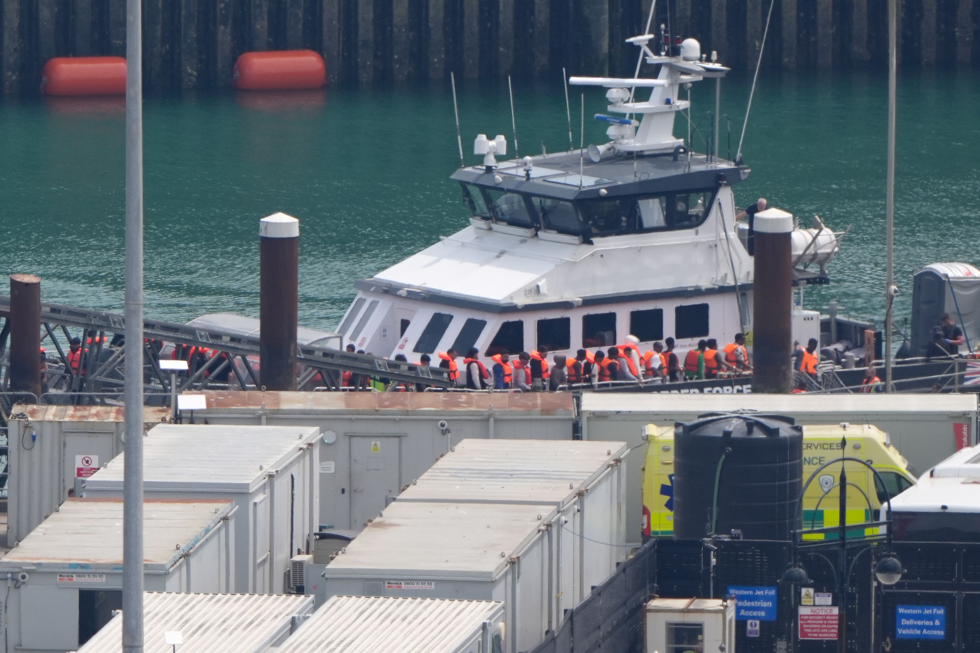 Some 879 migrants made the journey across the Channel in 13 boats on Monday (PA)