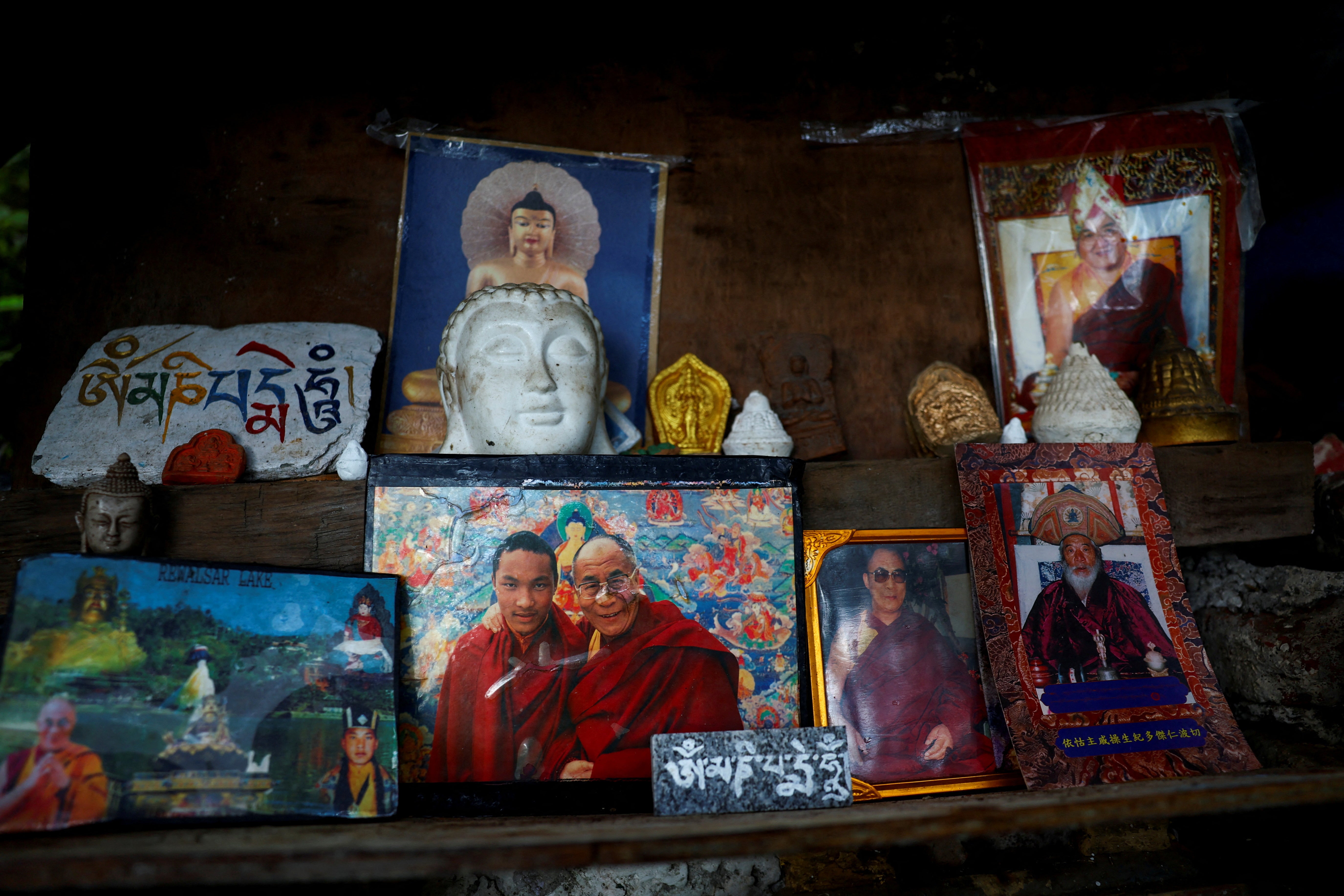 A photo of the Dalai Lama is displayed near Tsuglagkhang, also known as the Dalai Lama’s temple complex, in the northern hill town of Dharamshala, India