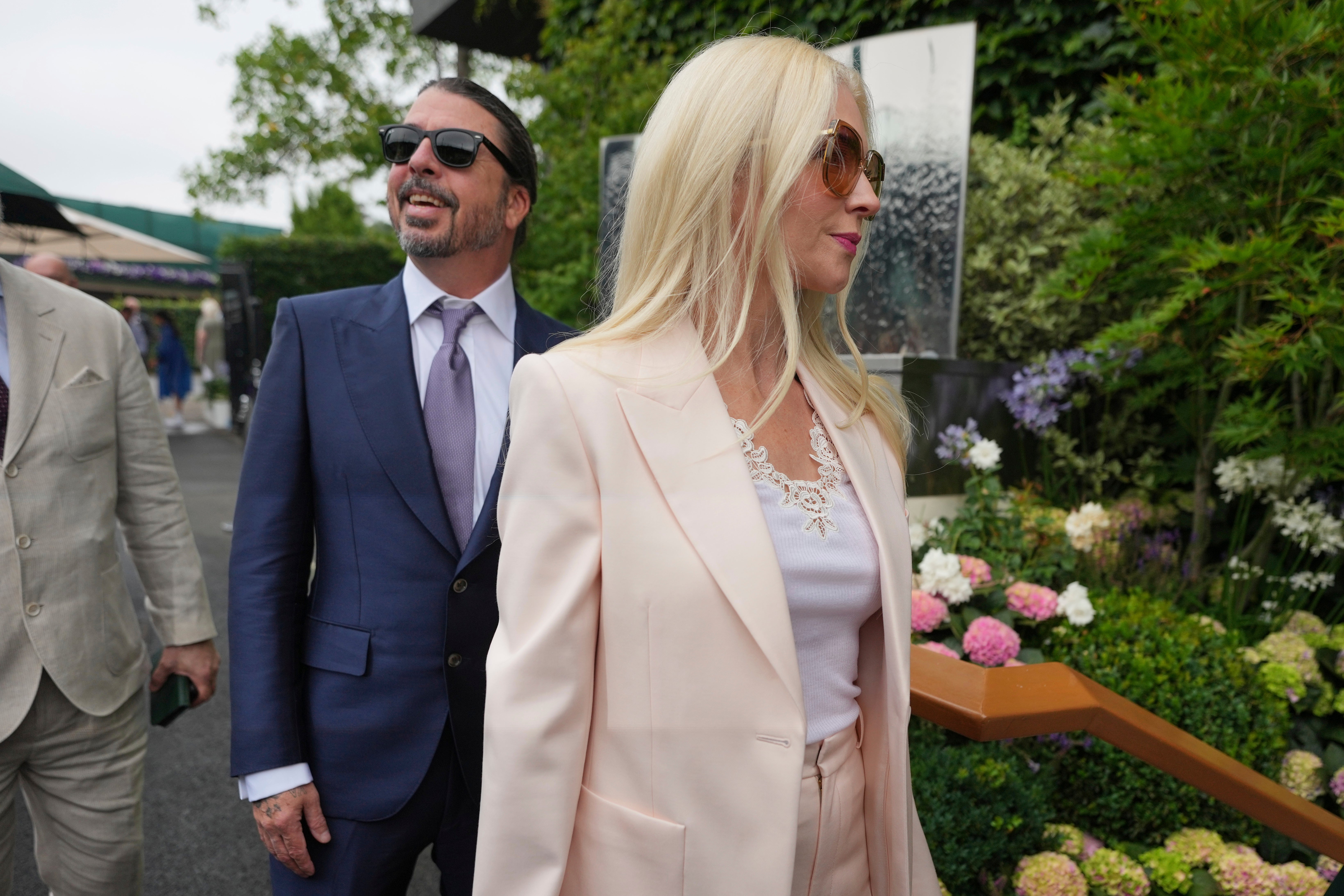 Dave Grohl and his wife Jordyn arrive for day three at the Wimbledon