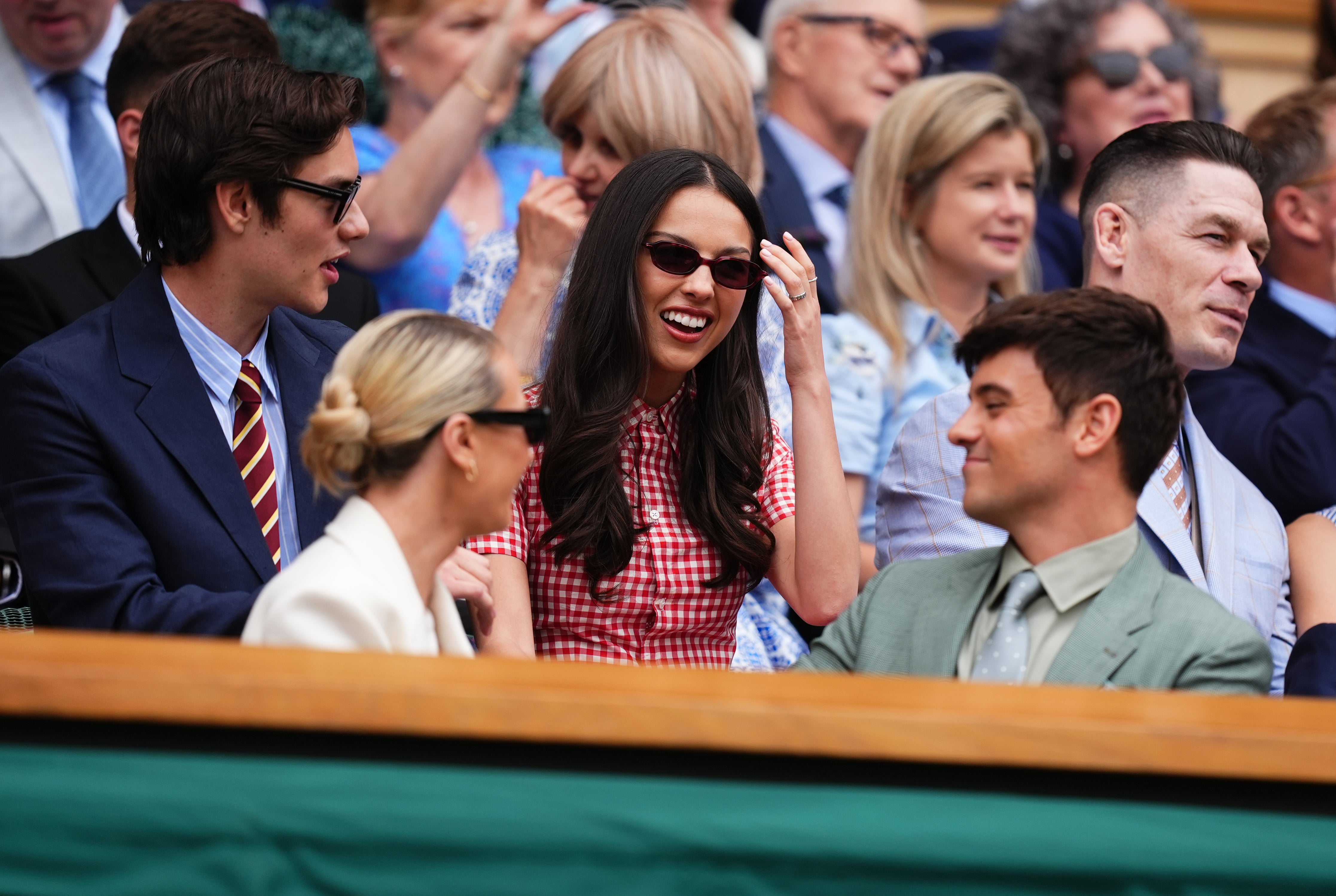 Olivia Rodrigo and Louis Partridge chatting with Tom Daley