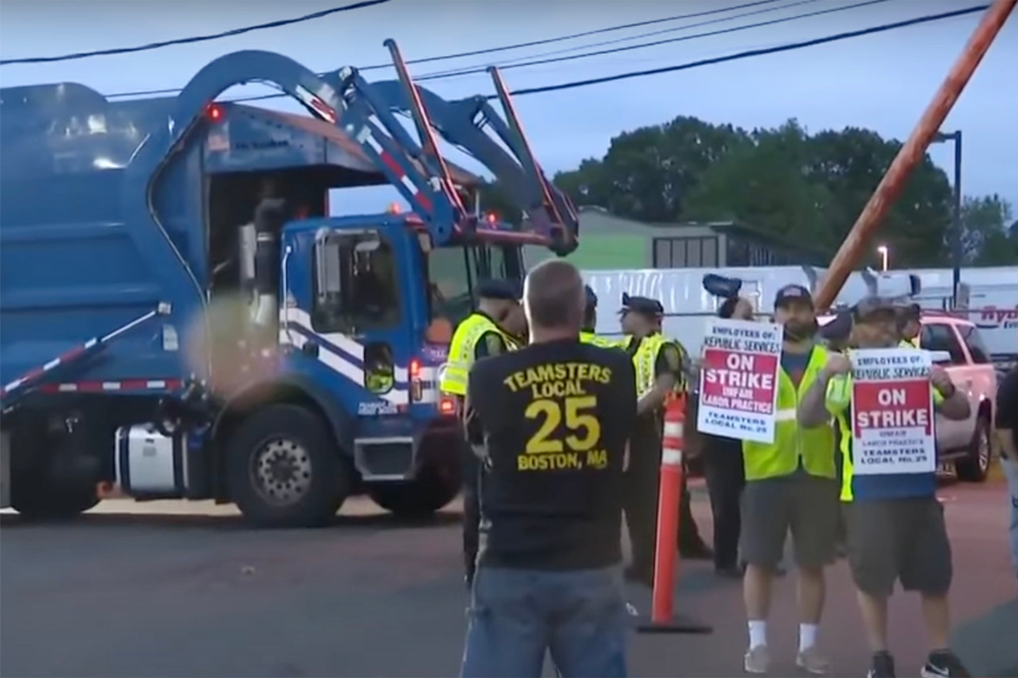 Over 400 workers for Republic Services in Massachusetts refused to go to work on Tuesday, leaving at least 14 cities and towns without trash pick-up