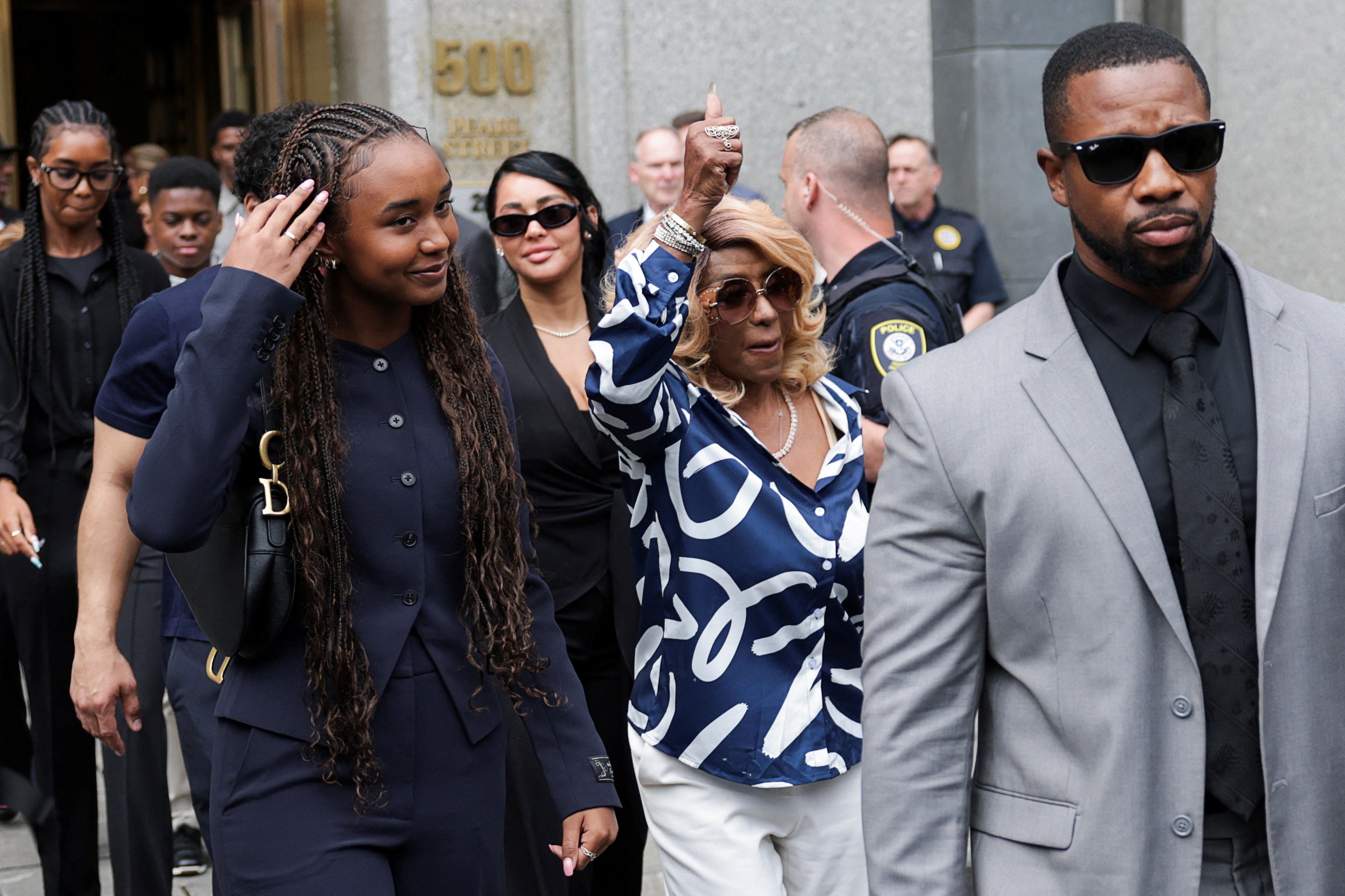 Janice and Chance Combs walk outside the US federal court after the jury reached verdicts in the trial