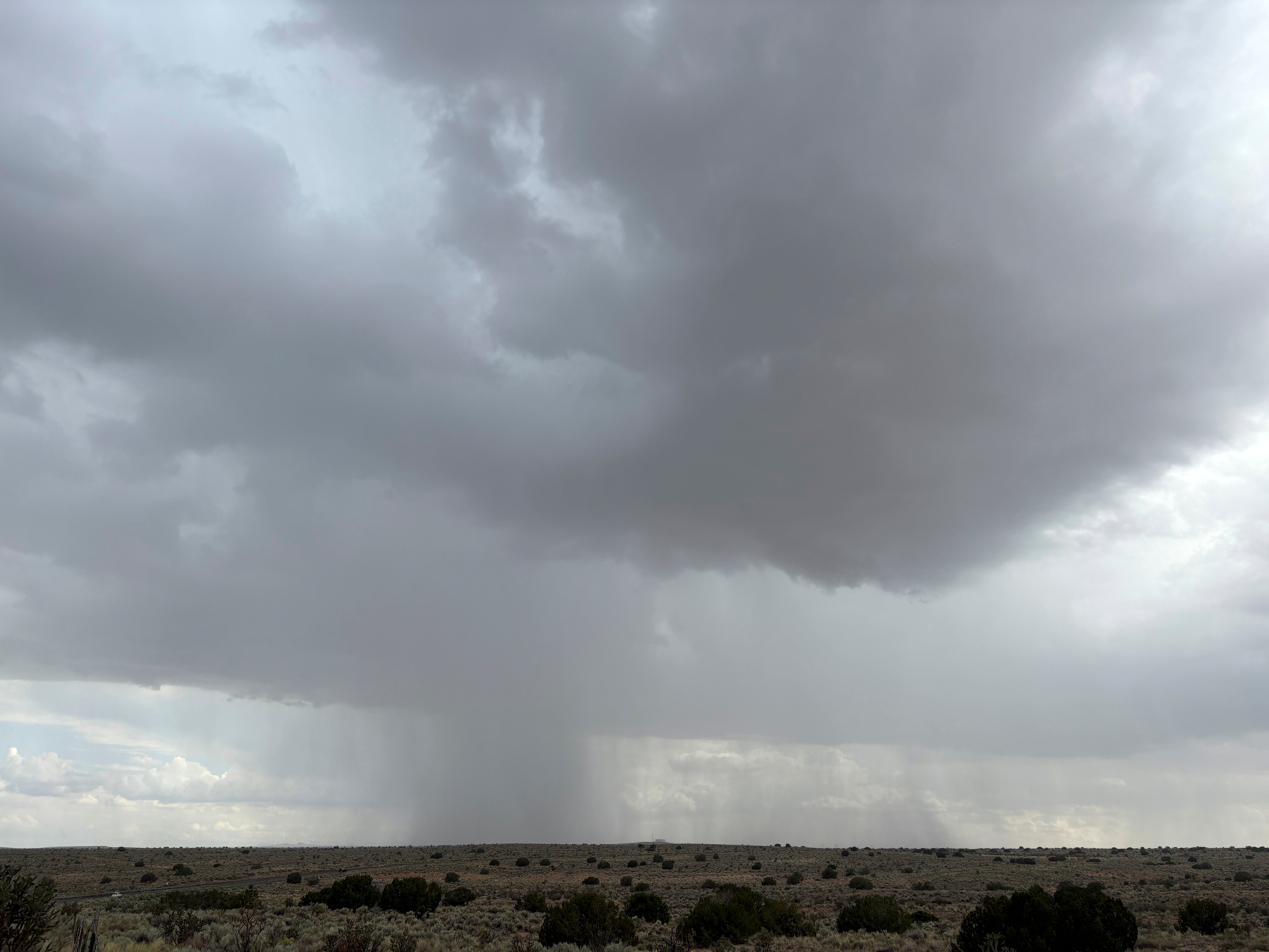 As the monsoon cranks up in the southwestern U.S., a rainstorm moves across the plains near Rio Rancho, New Mexico, on July 1, 2025