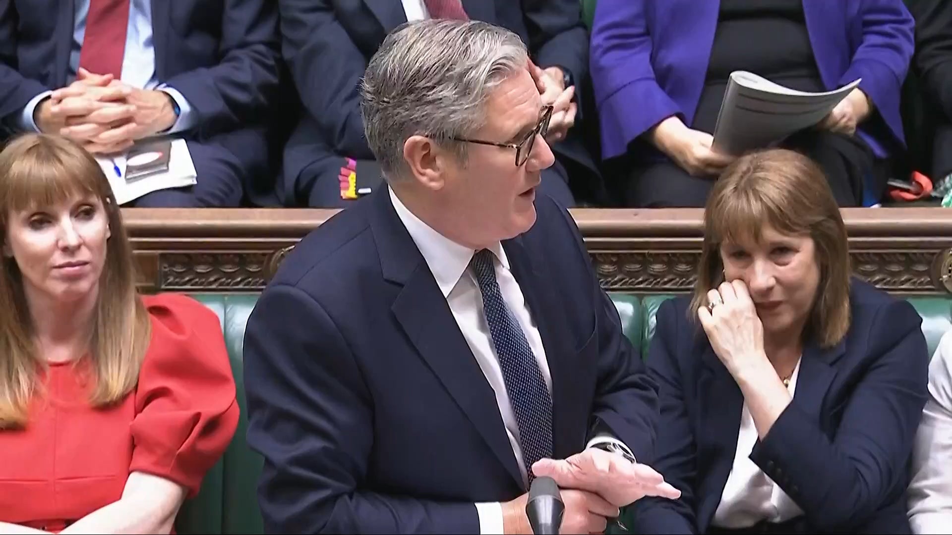 Chancellor of the Exchequer Rachel Reeves (right) crying as Prime Minister Sir Keir Starmer speaks during Prime Minister’s Questions (UK Parliament/PA)