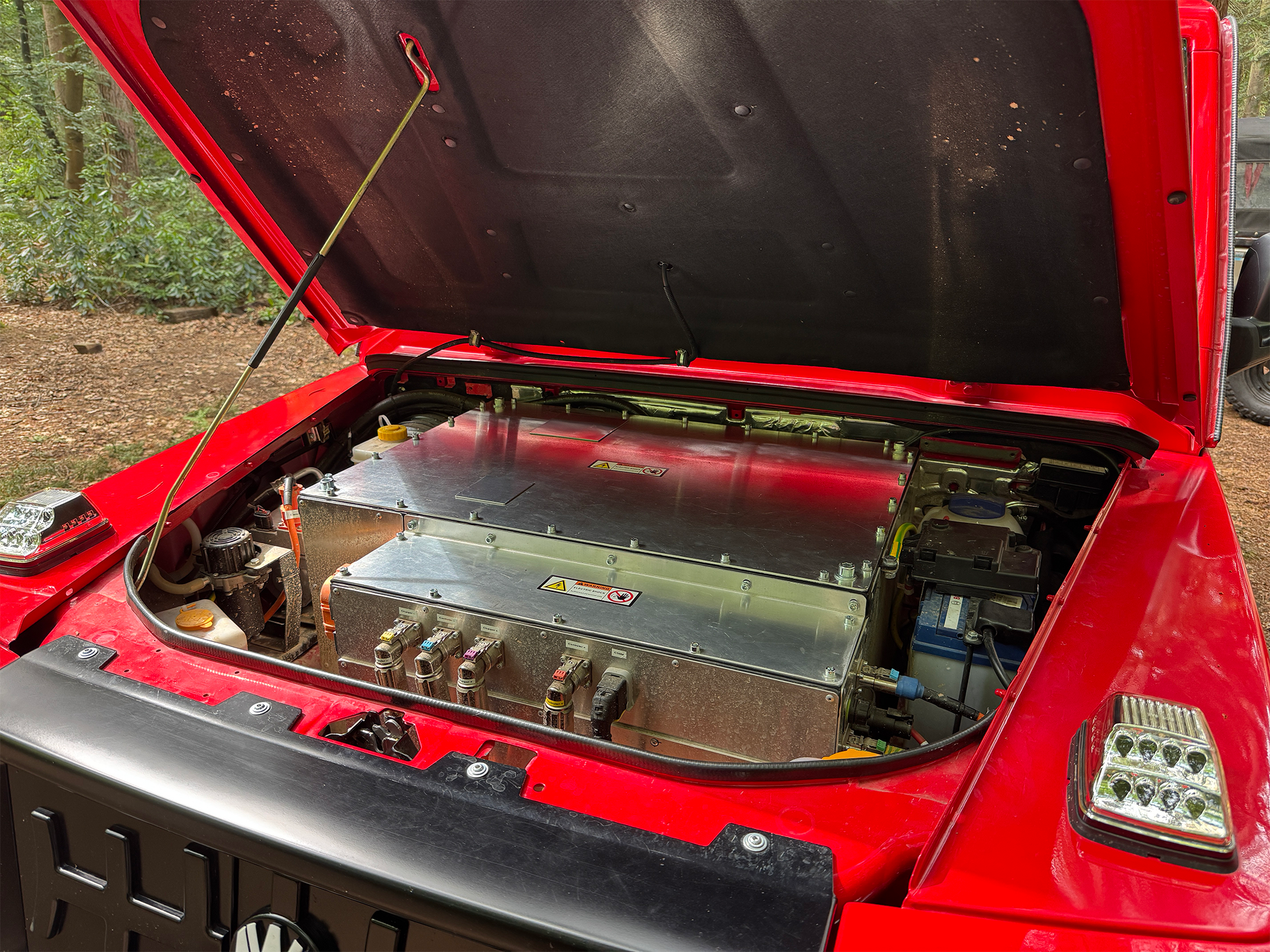 The battery is housed in the front rather than under the car, massively improving durability when off-road