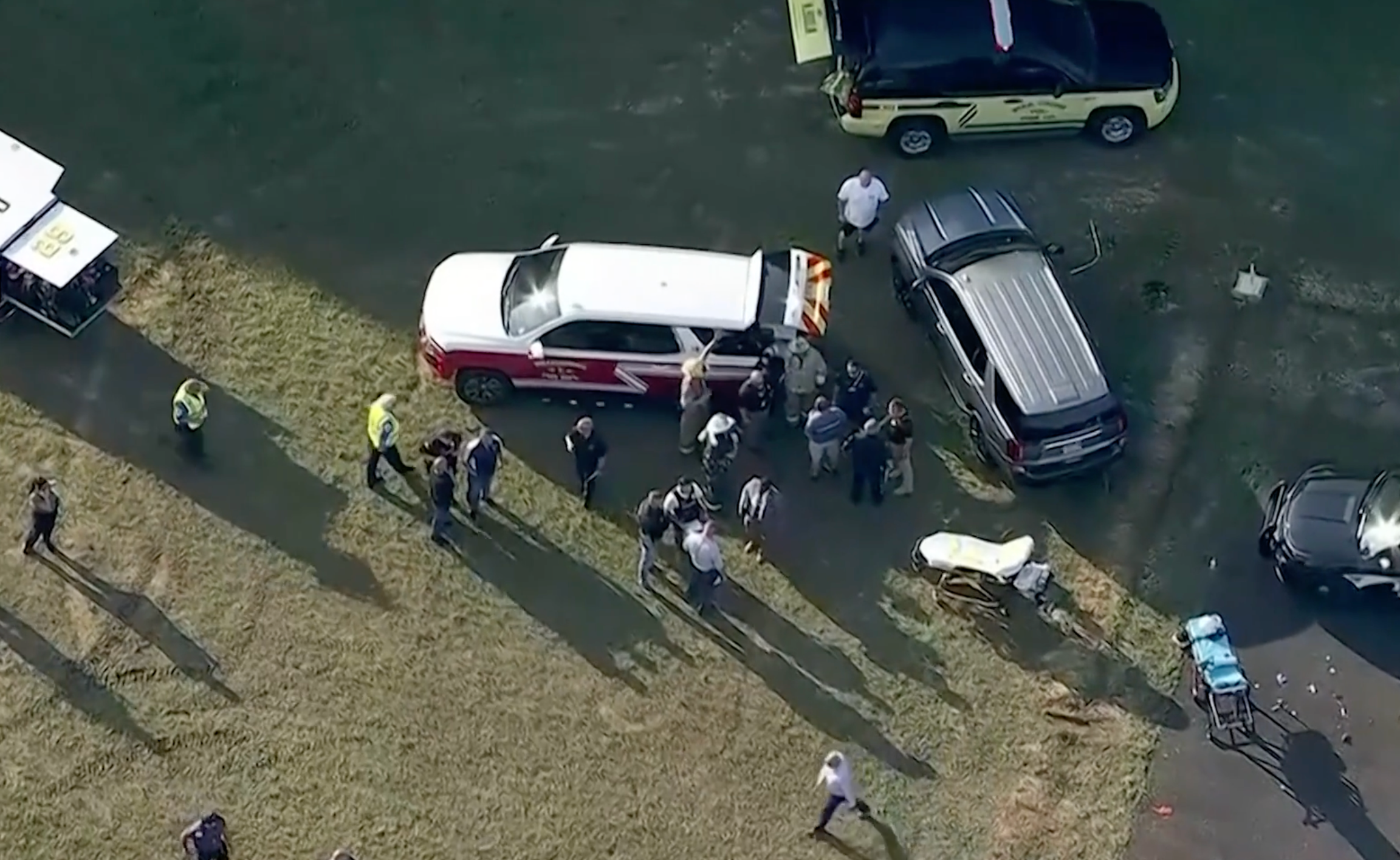 Bodies were shown being stretched away, with 15 left injured after Wednesday evening's crash