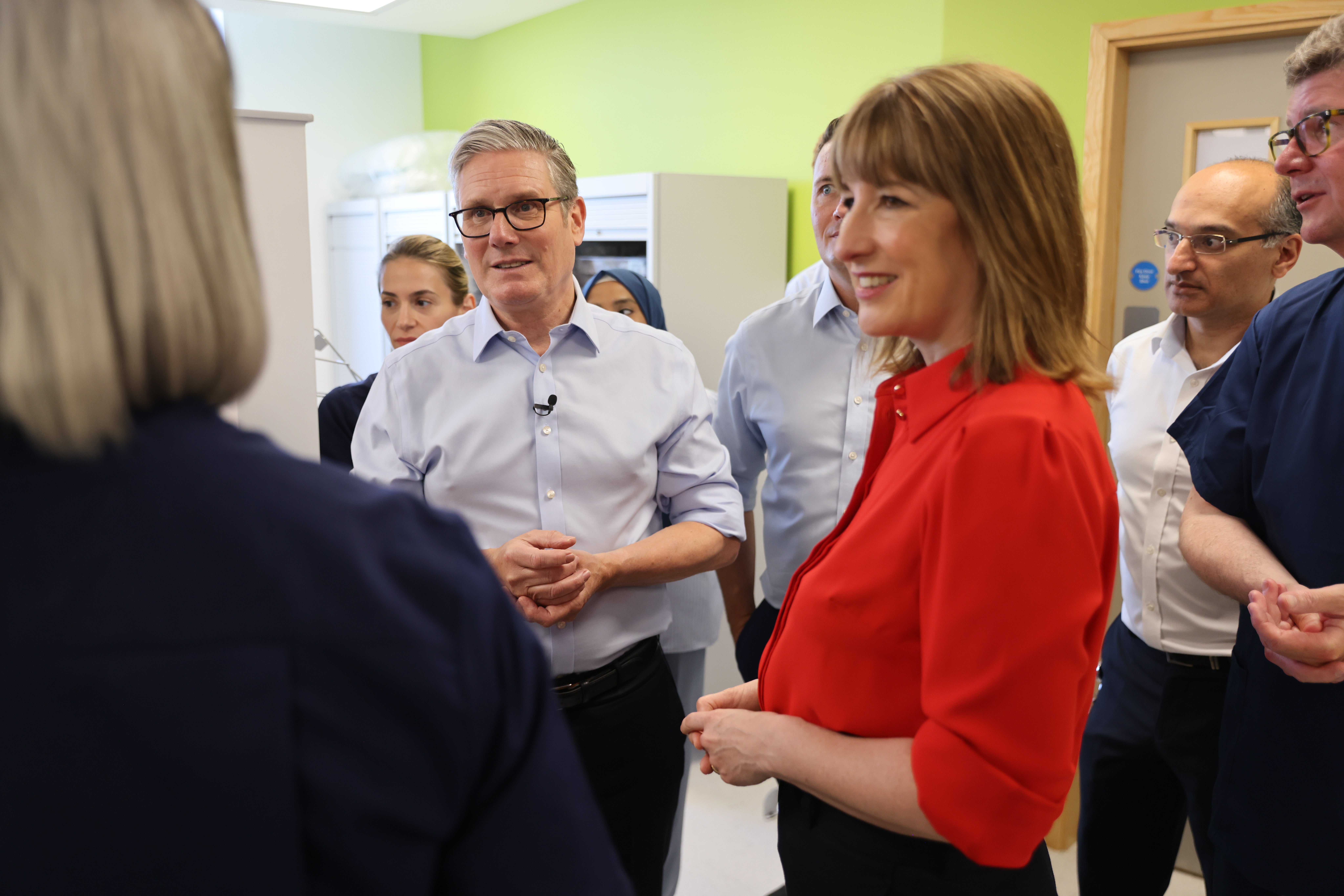 Chancellor of the Exchequer Rachel Reeves, Prime Minister Sir Keir and Health Secretary Wes Streeting speak to staff at the launch of the Government’s 10-year health plan (Jack Hill/The Times/PA)