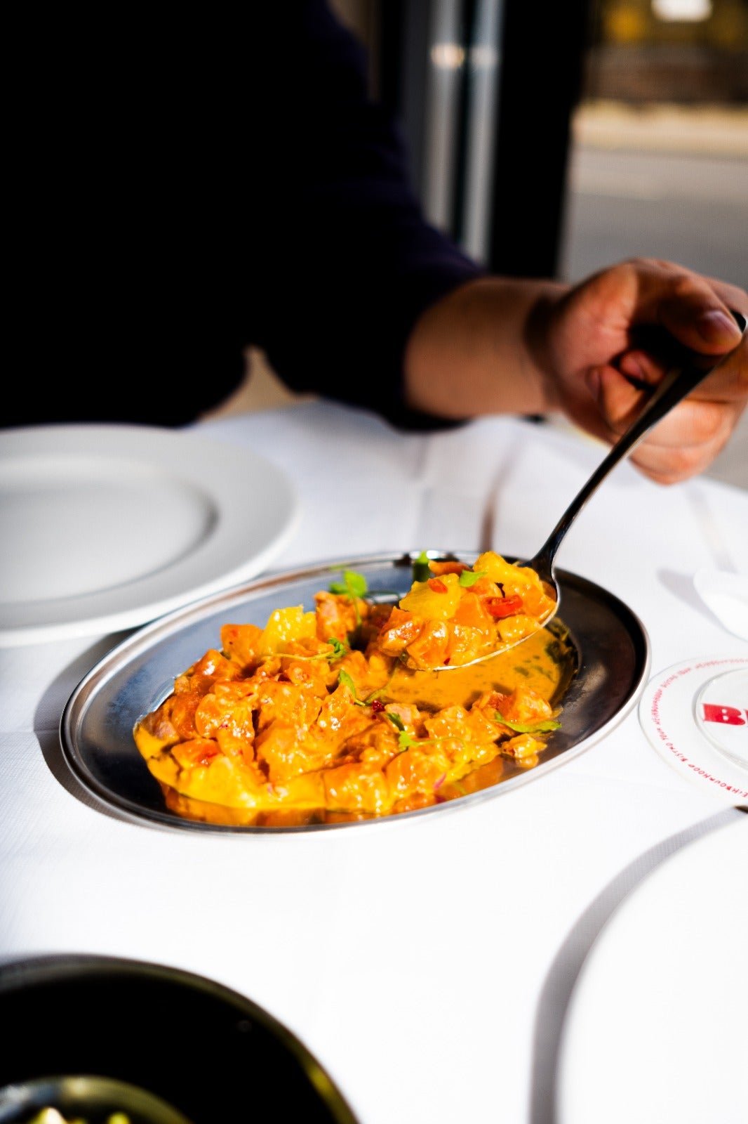 A vibrant take on kinilaw: citrus-cured trout with coconut, chilli and seasonal fruit – proof that Filipino flavours can be both elegant and bold