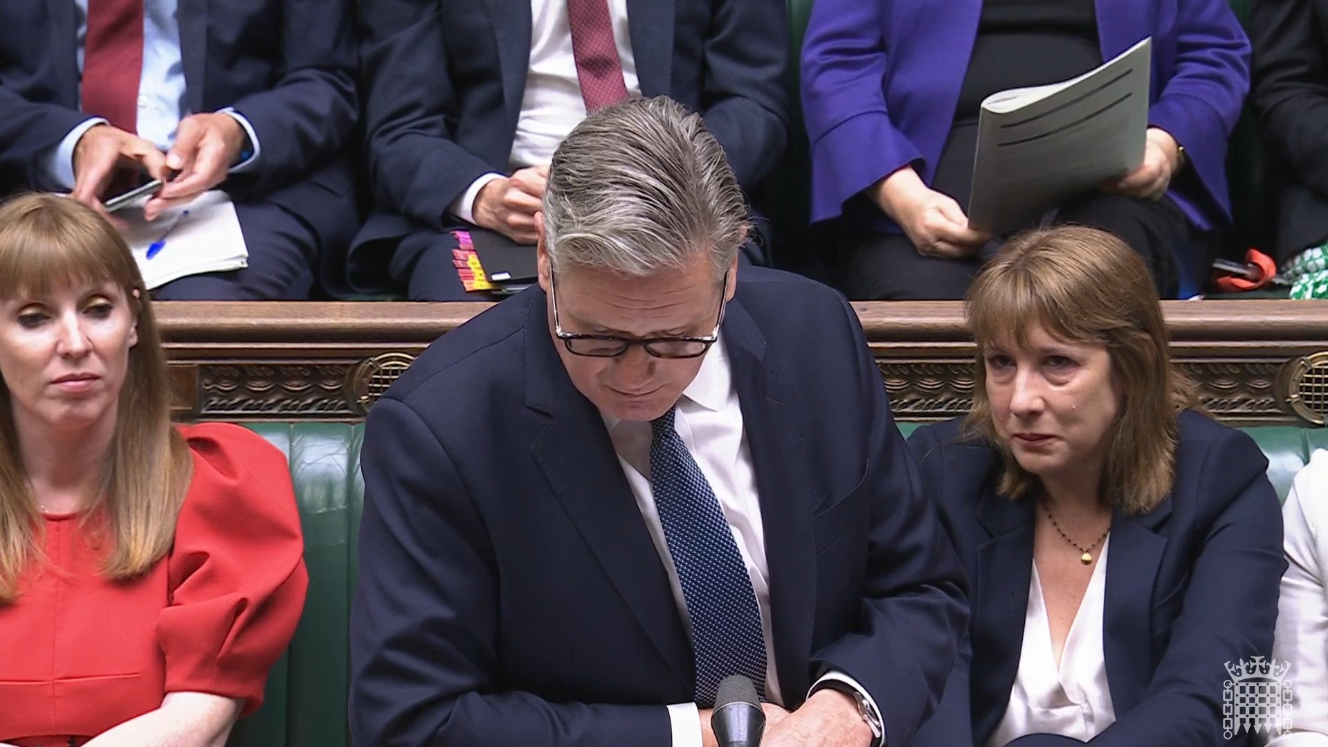 Chancellor of the Exchequer Rachel Reeves (right) crying as Prime Minister Sir Keir Starmer speaks during Prime Minister’s Questions in the House of Commons (House of Commons/UK Parliament/PA)
