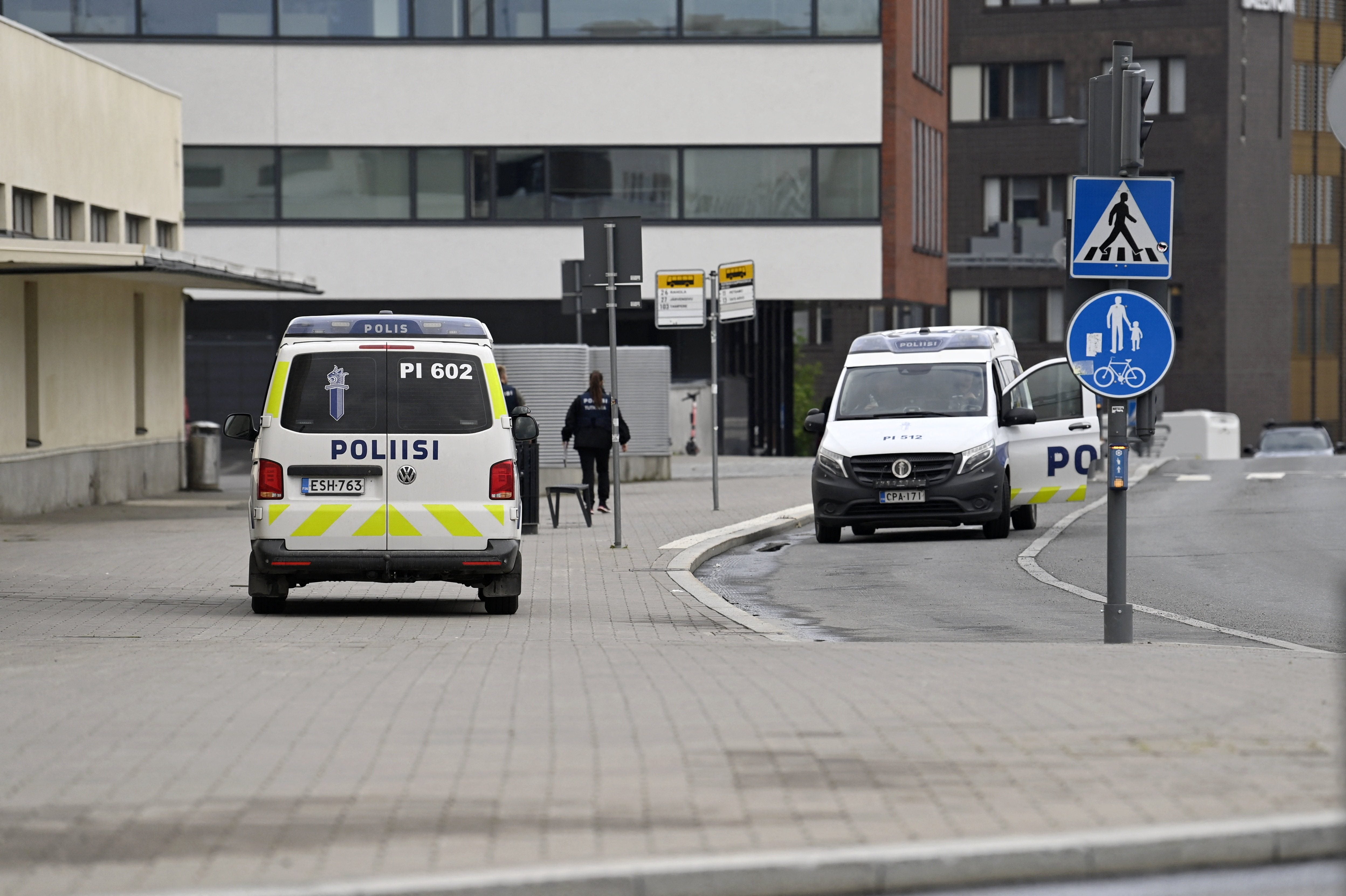 Police vehicles at the scene following the stabbing in Finland