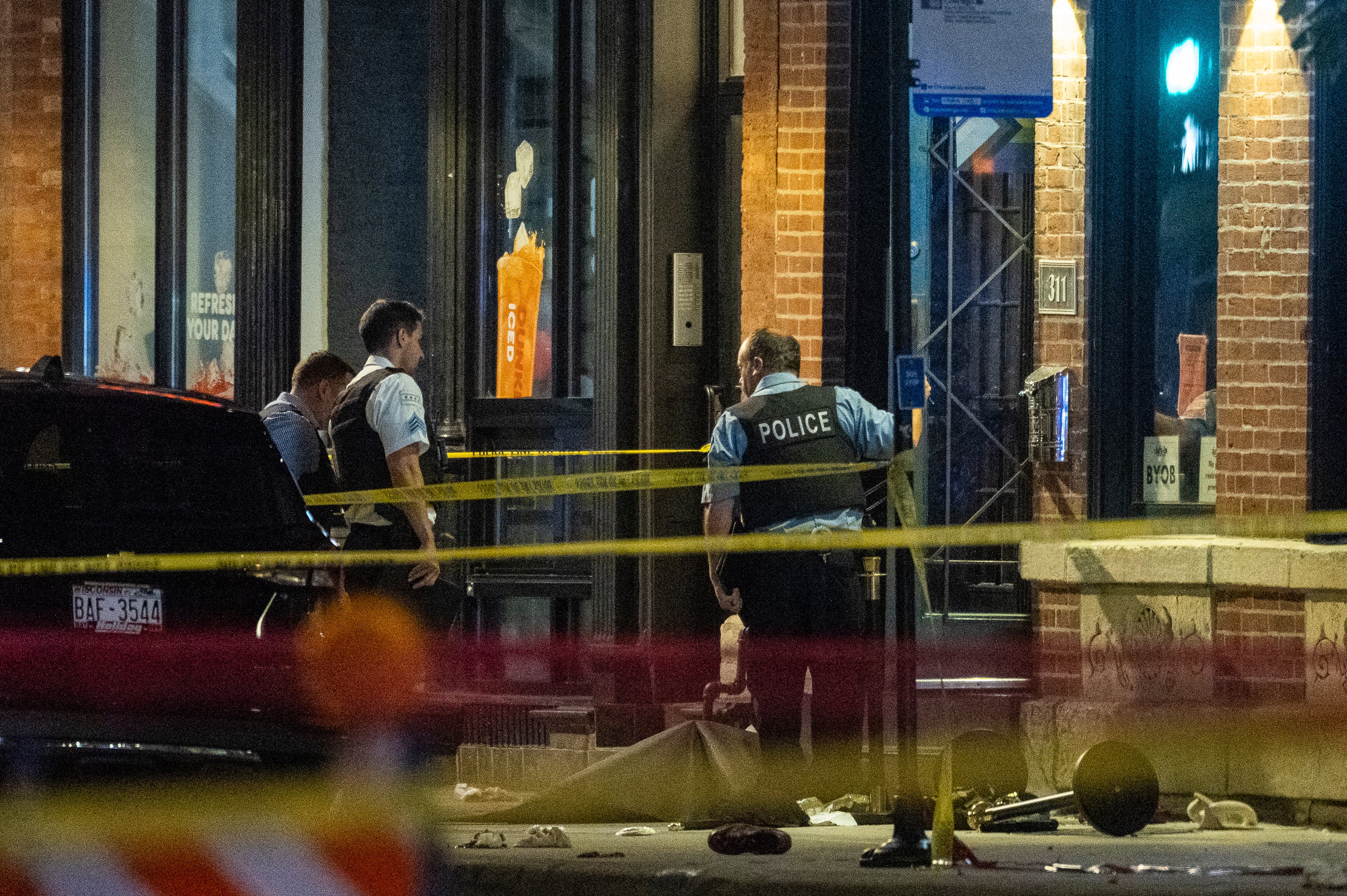 Four people died and 14 others wounded in a Chicago drive-by shooting on Wednesday night