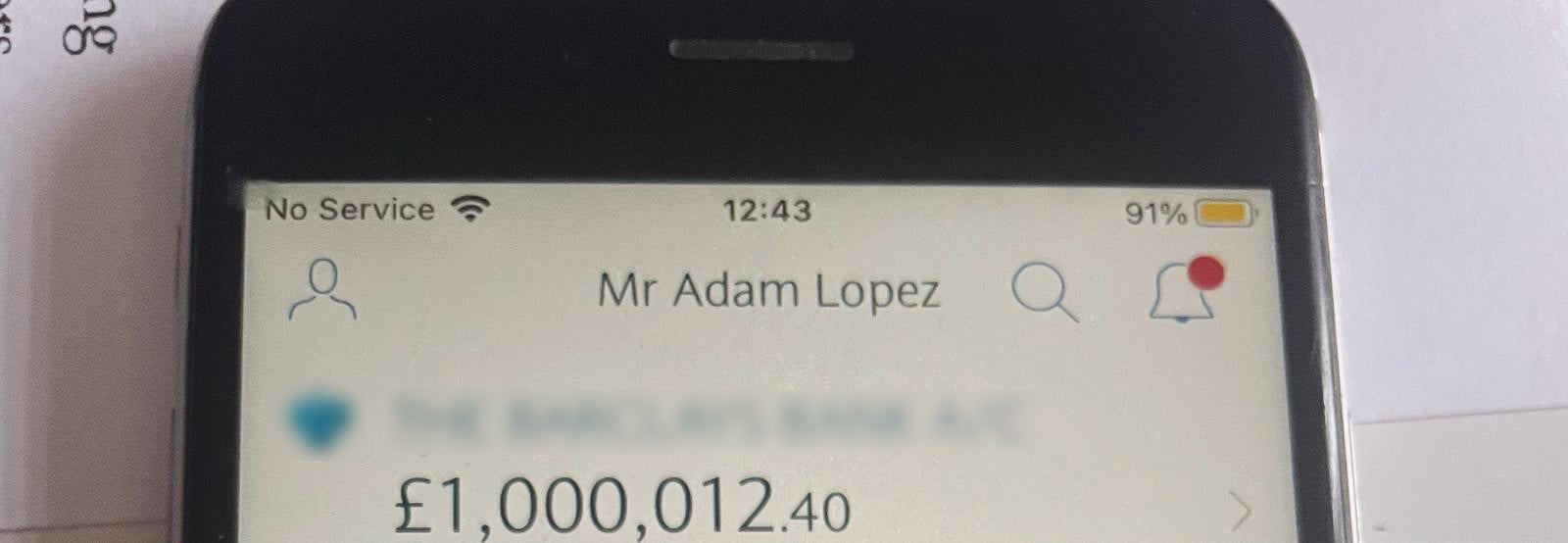 Mobile phone showing the bank balance of 39-year-old builder Adam Lopez, from Norwich, who won £1M on a National Lottery scratchcard.