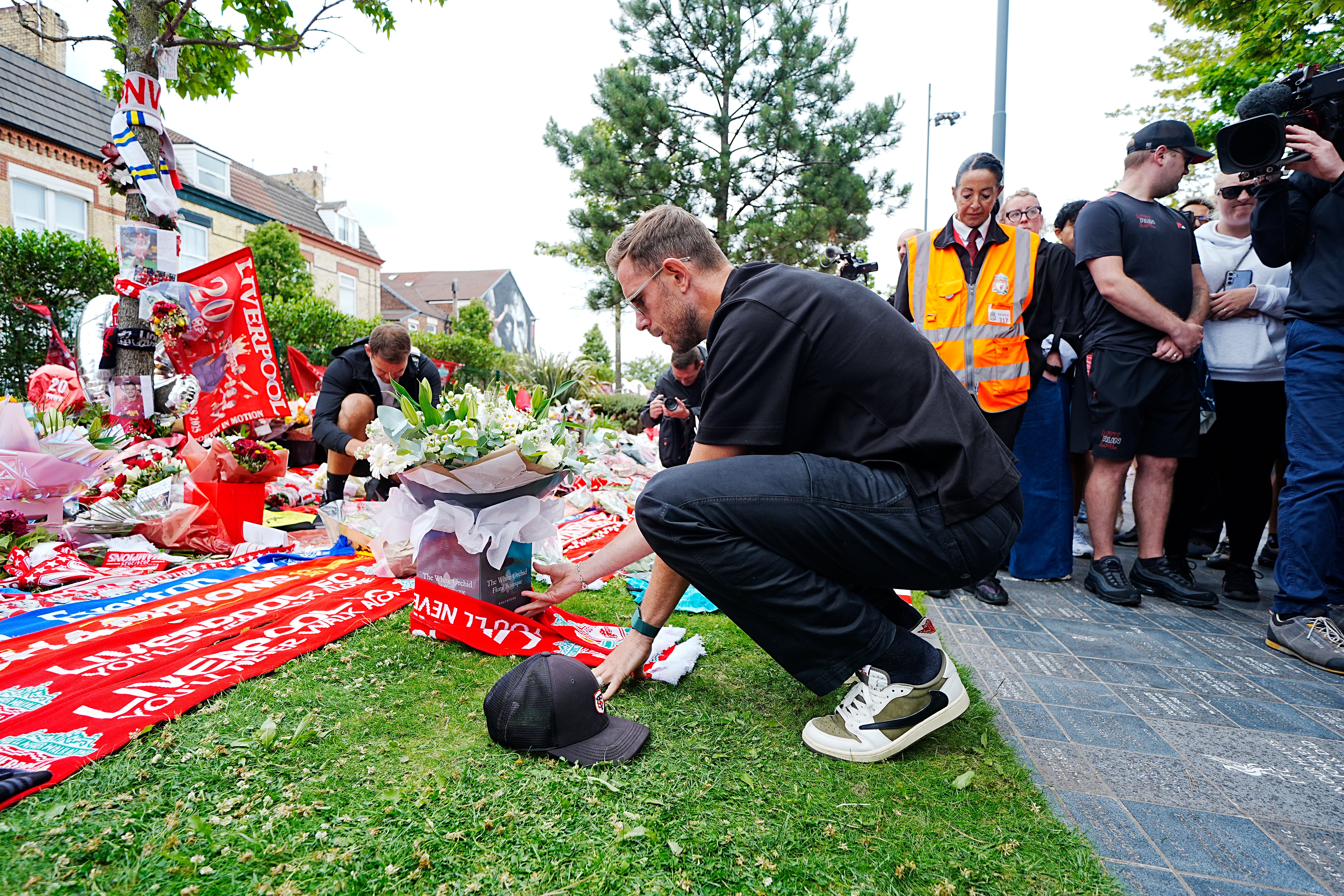 Liverpool’s Jordan Henderson wipes away tears as he pays emotional tribute to Diogo Jota at Anfield