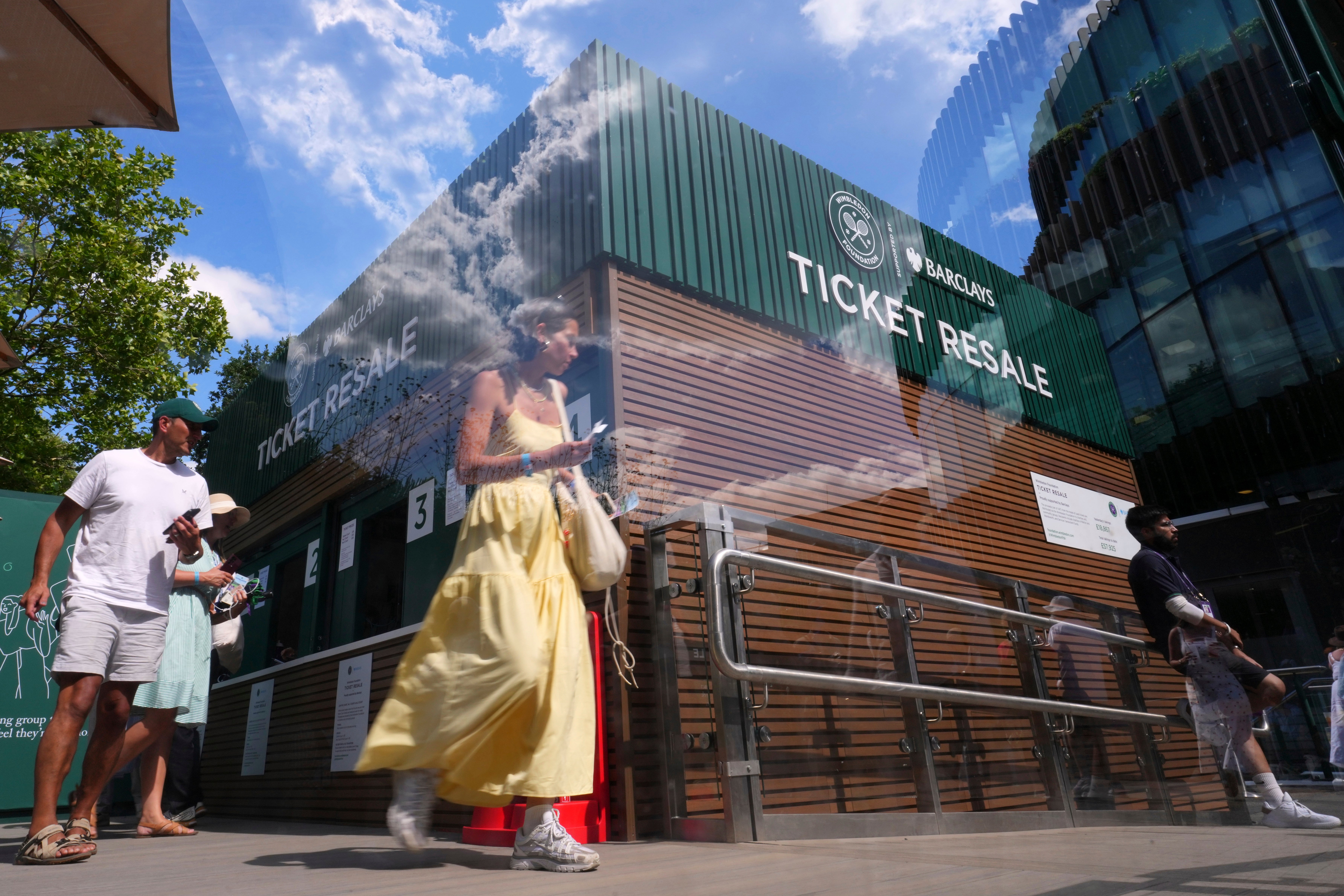People outside the ticket resale office at the tennis grounds