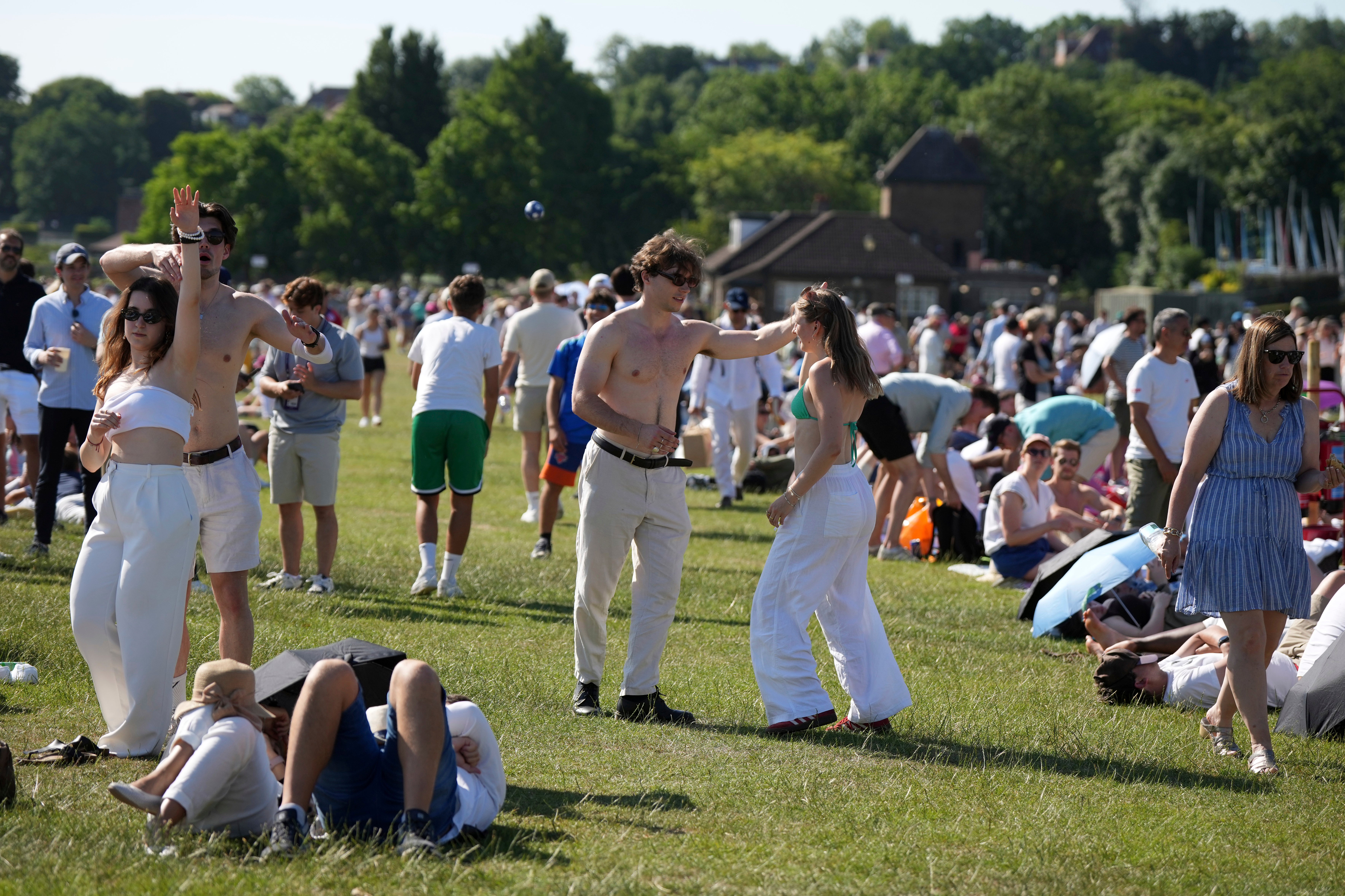 People queue to get into the Wimbledon grounds
