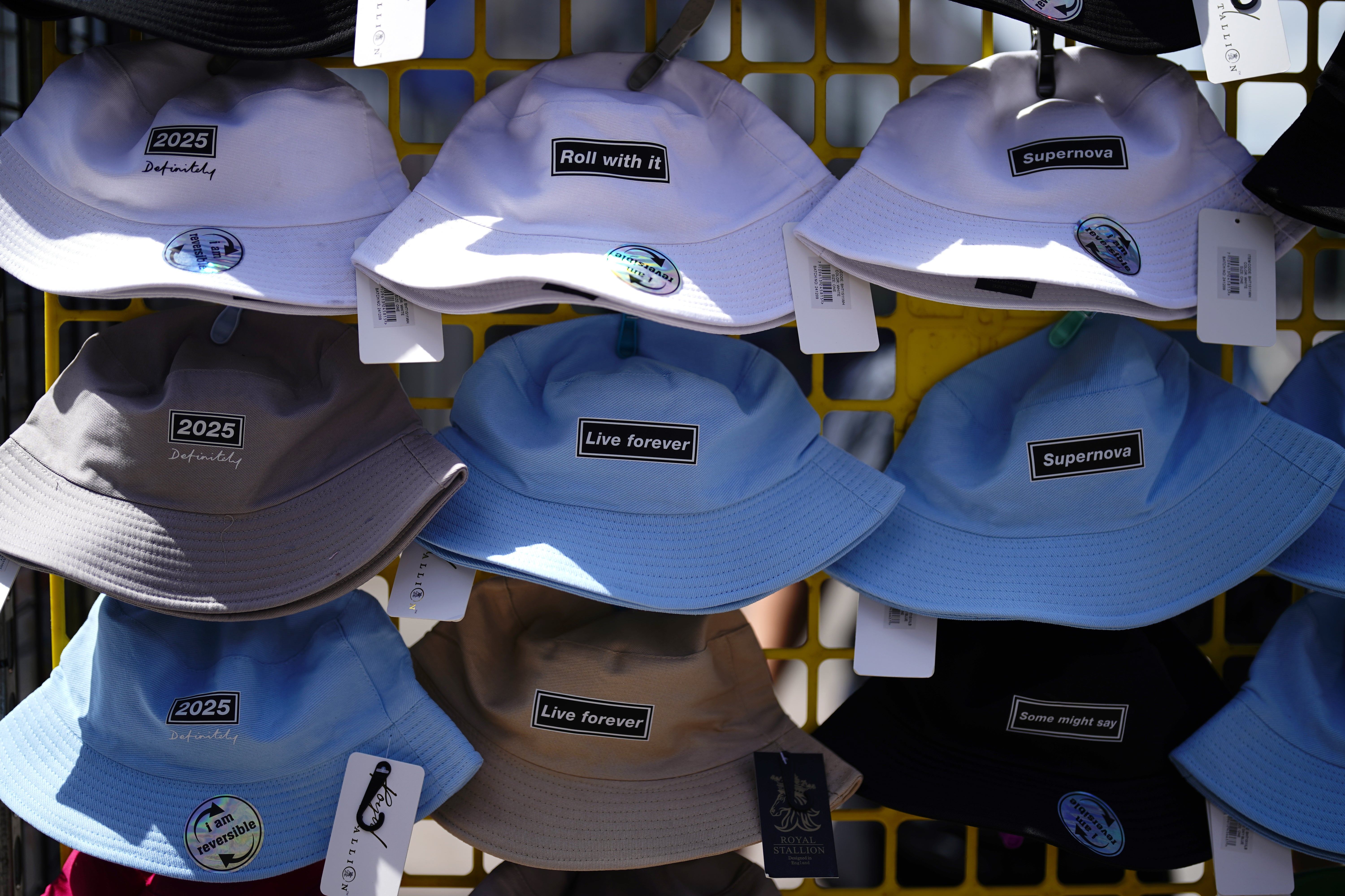 Song title themed bucket hats on sale in the centre of Cardiff (Jordan Pettitt/PA)