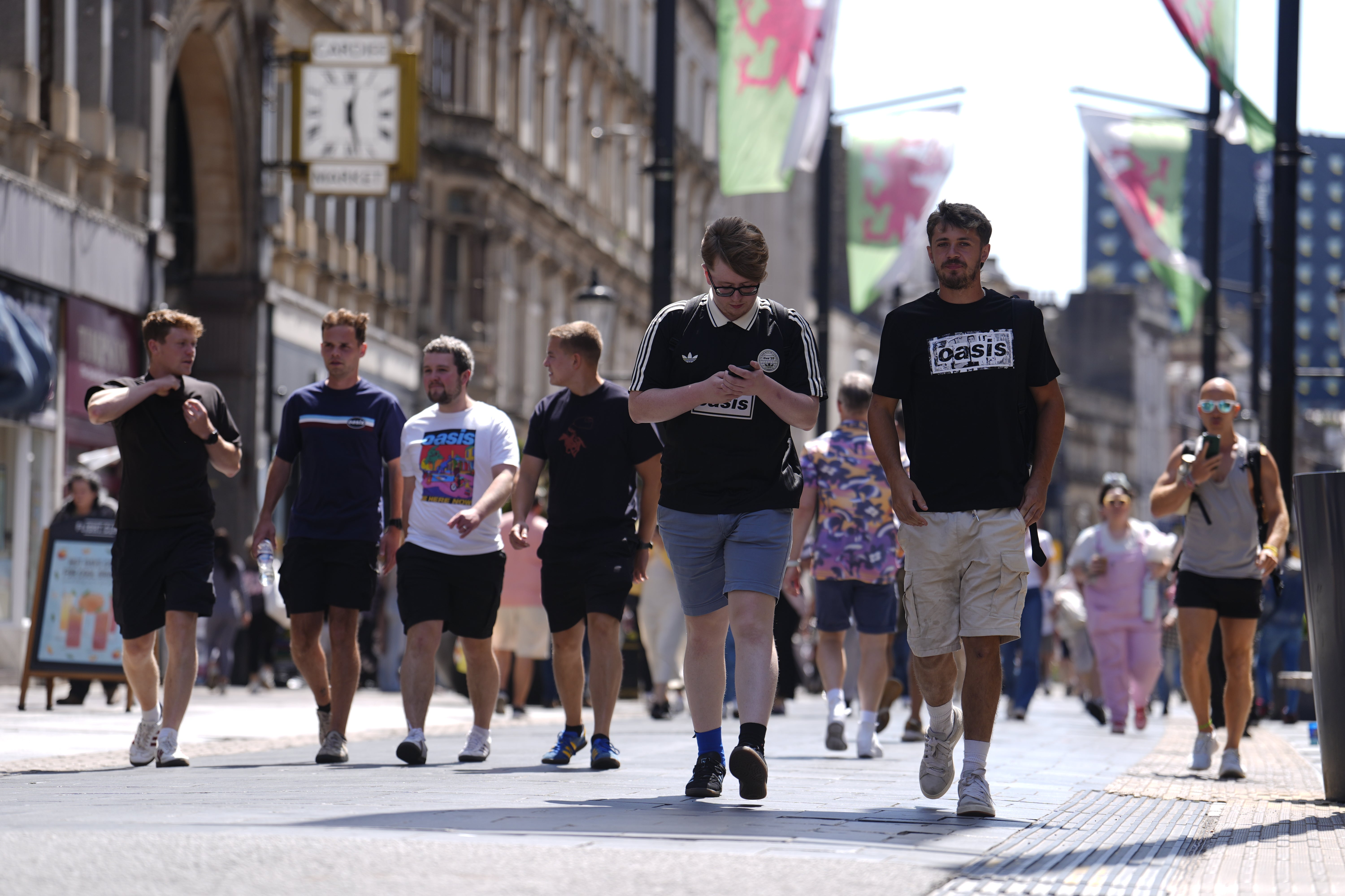 Some fans went for a leisurely stroll around Cardiff city centre (Jordan Pettitt/PA)