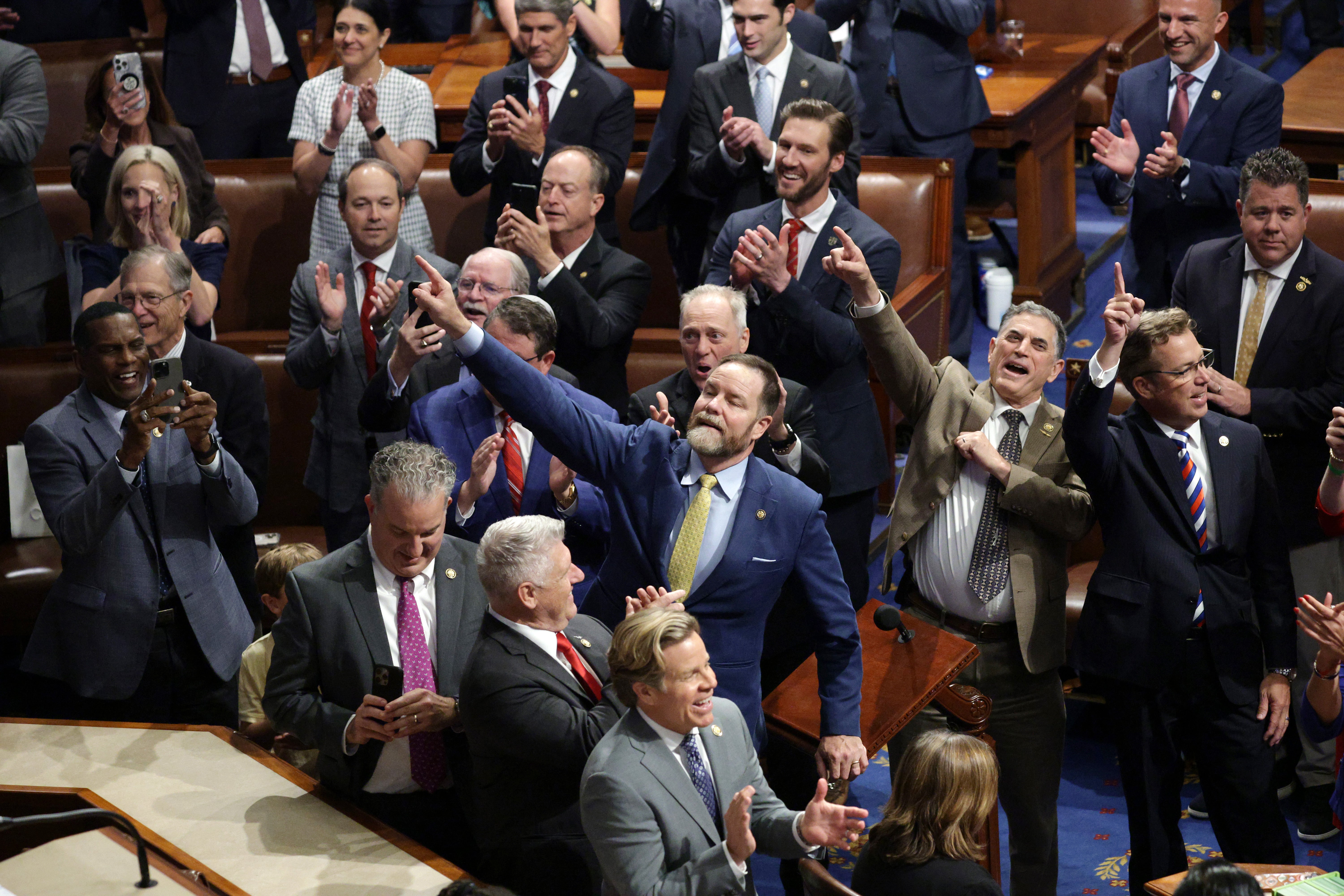 Republicans celebrating the passage of Trump’s bill in the House
