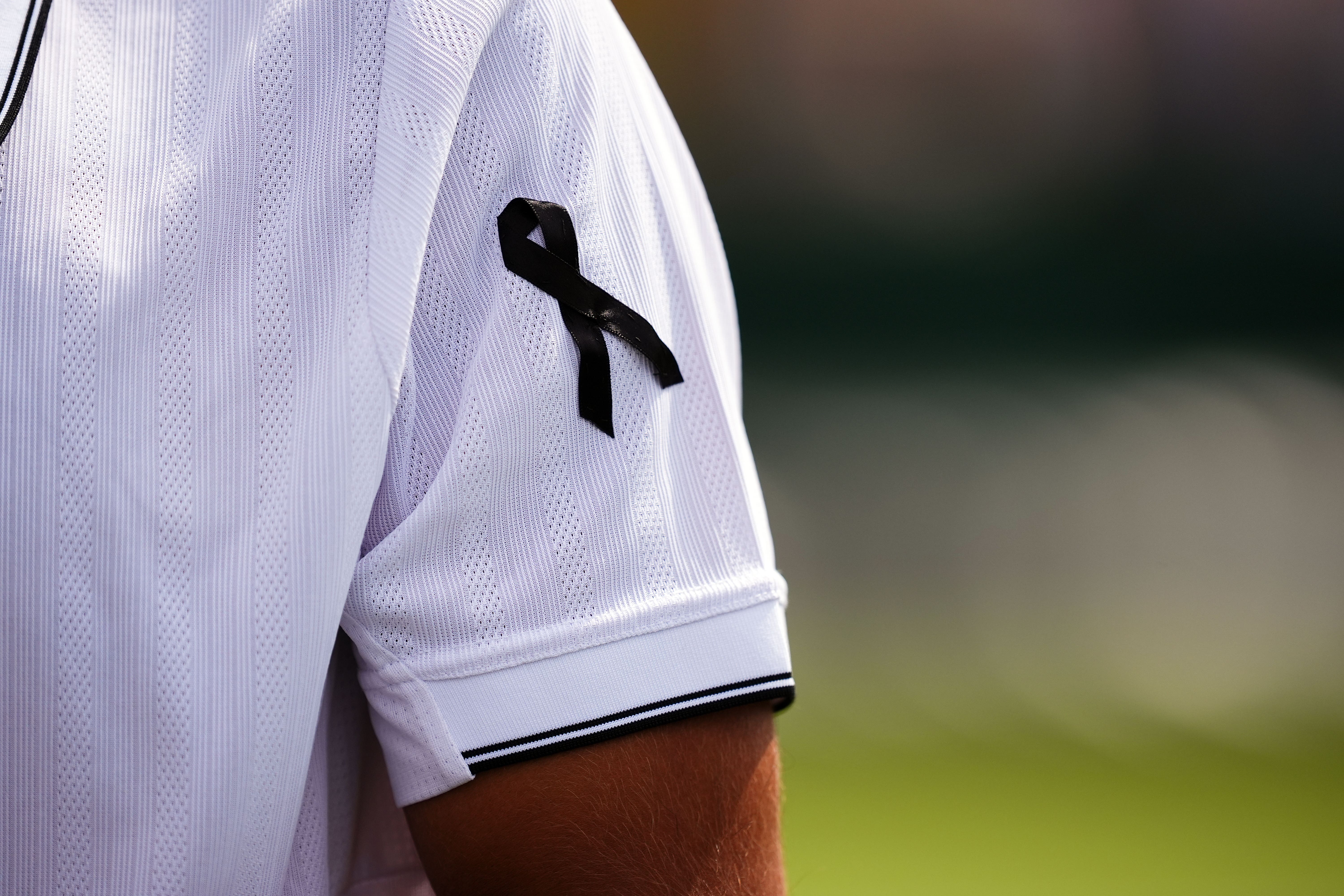 A close up of Francisco Cabral’s black ribbon, worn in memory of compatriot Diogo Jota (Mike Egerton/PA)