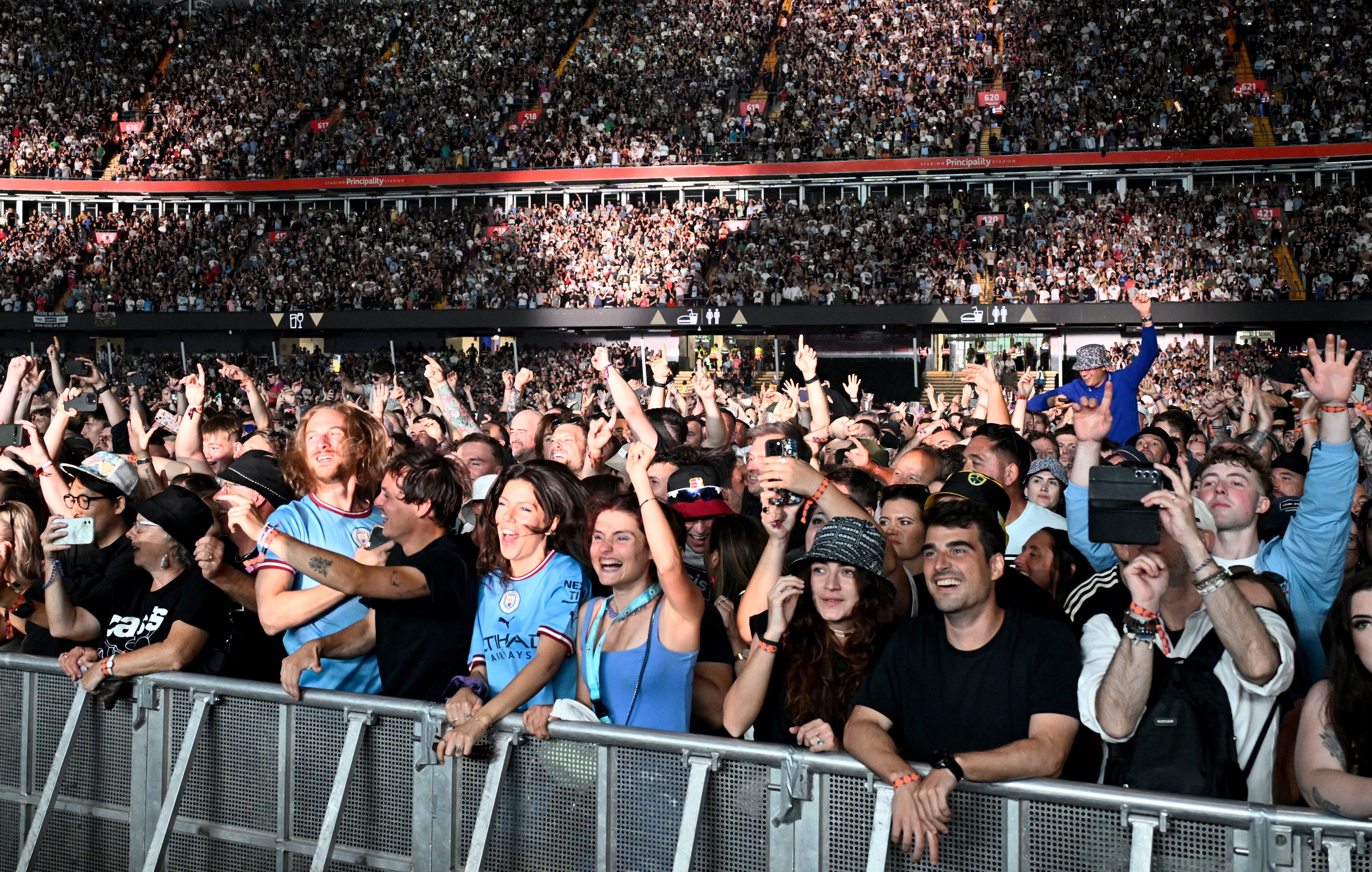 Oasis fans at the band’s first reunion show in Cardiff