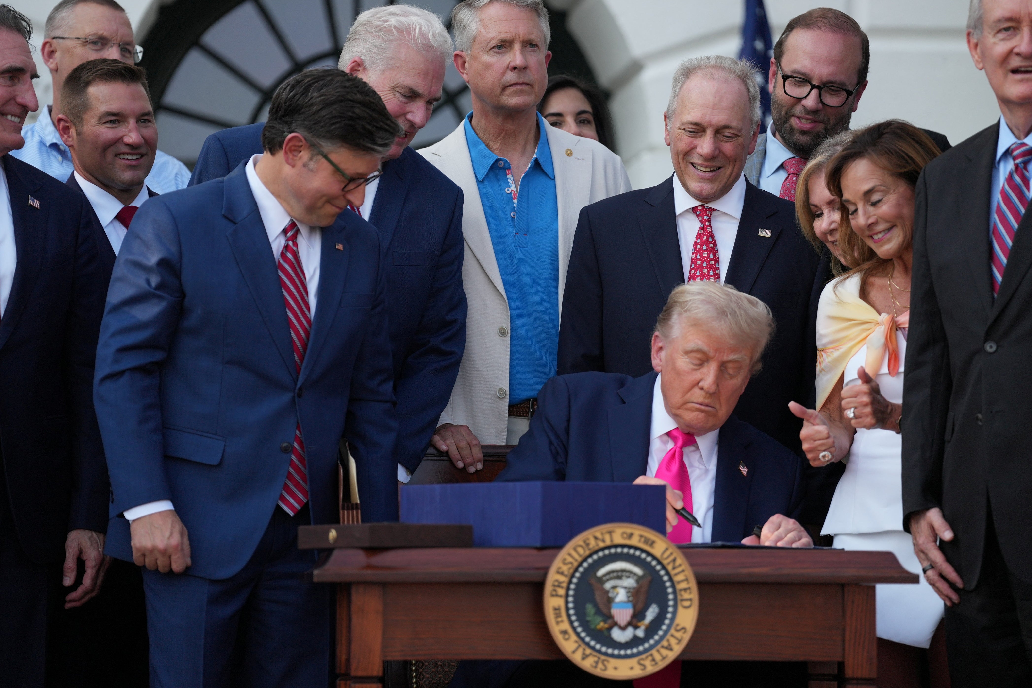 President Donald Trump signs his 'Big, Beautiful Bill' on the White House's South Lawn