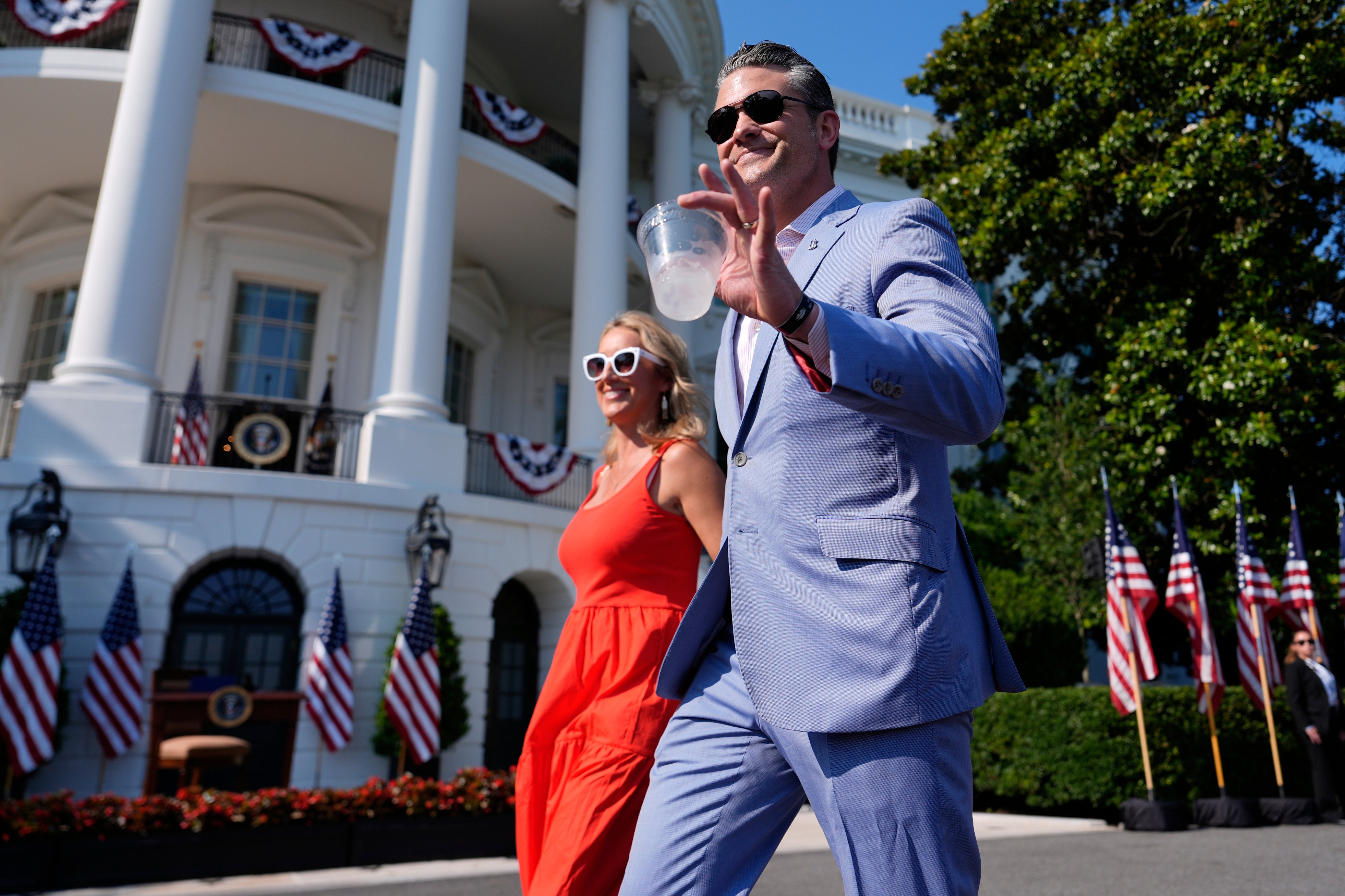 U.S. Defense Secretary Pete Hegseth and his wife Jennifer attend a Fourth of July celebration at the White House
