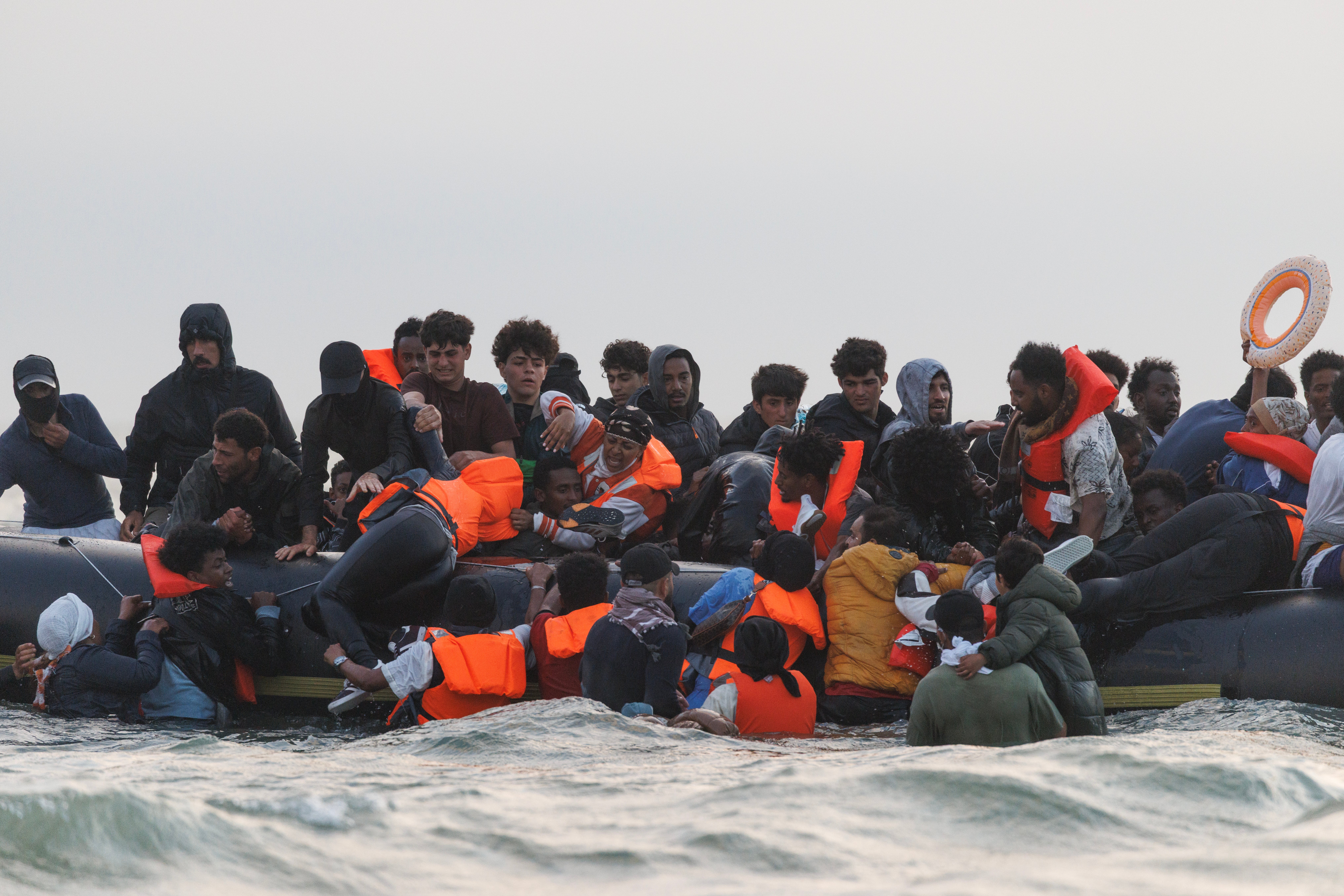 Families and children board a small boat on July 02, 2025 in Gravelines, France