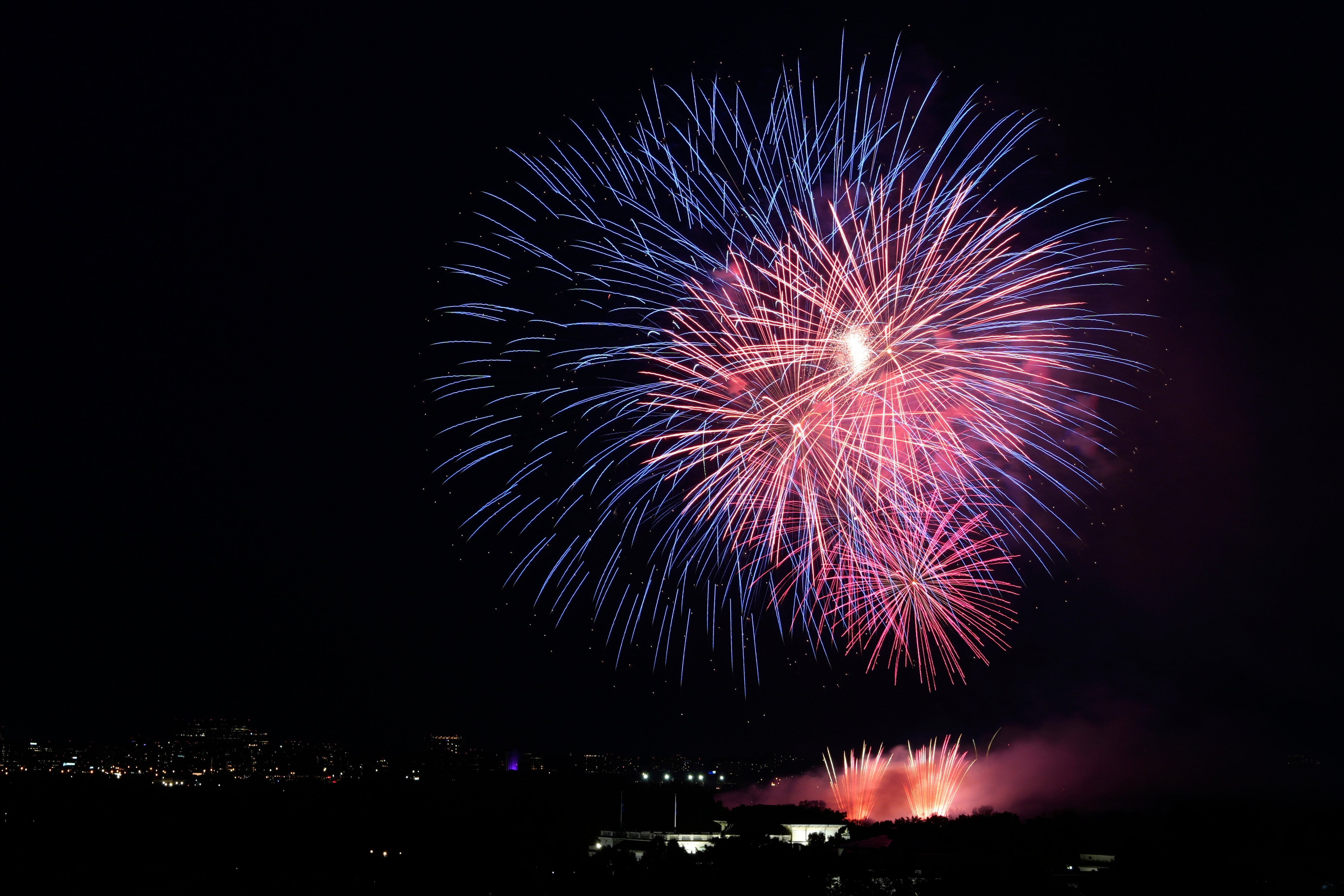 Fireworks explode over the National Mall in Washington, D.C.