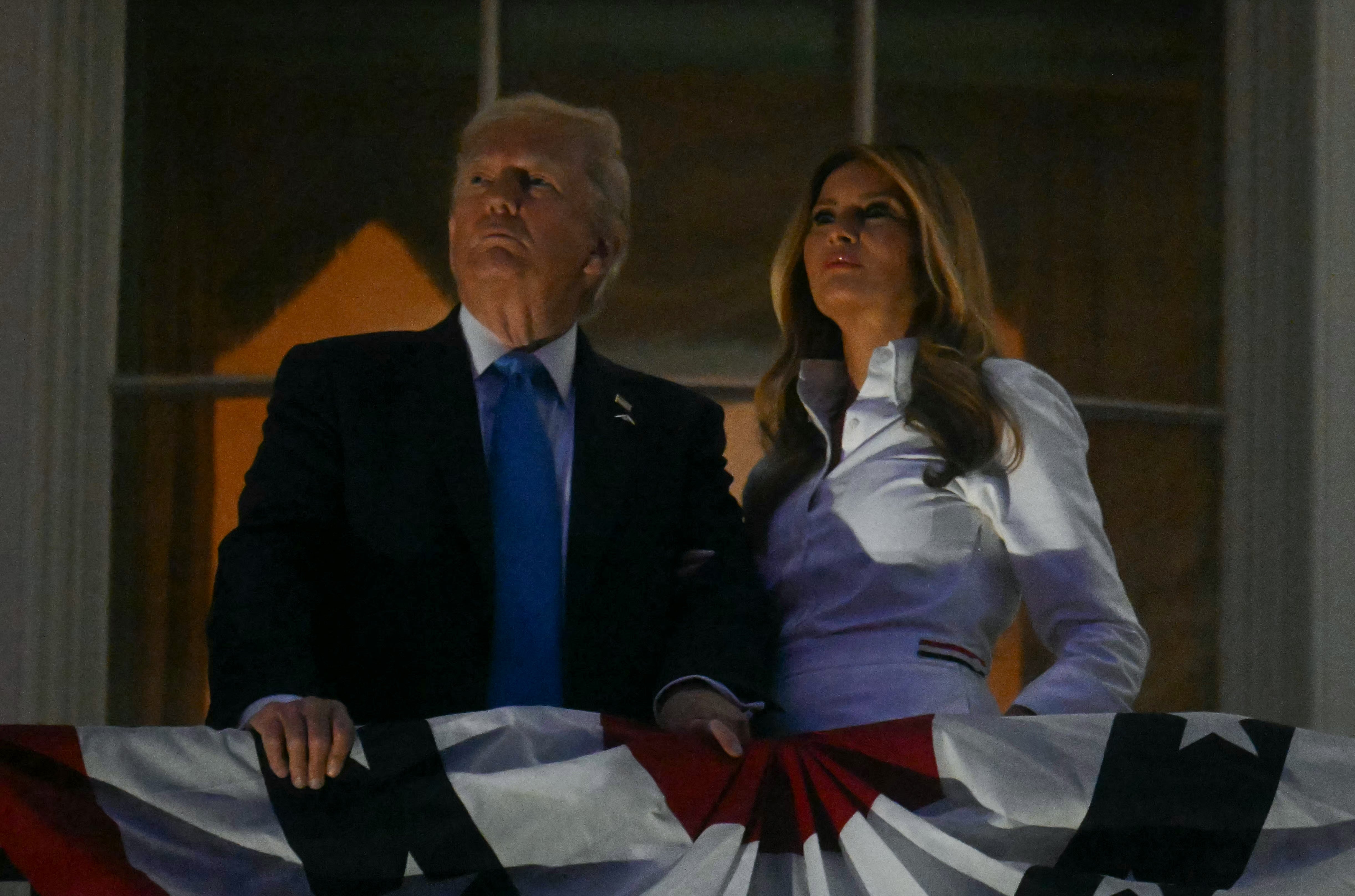 President Donald Trump and First Lady Melania Trump watch the Independence Day fireworks show in Washington, D.C.