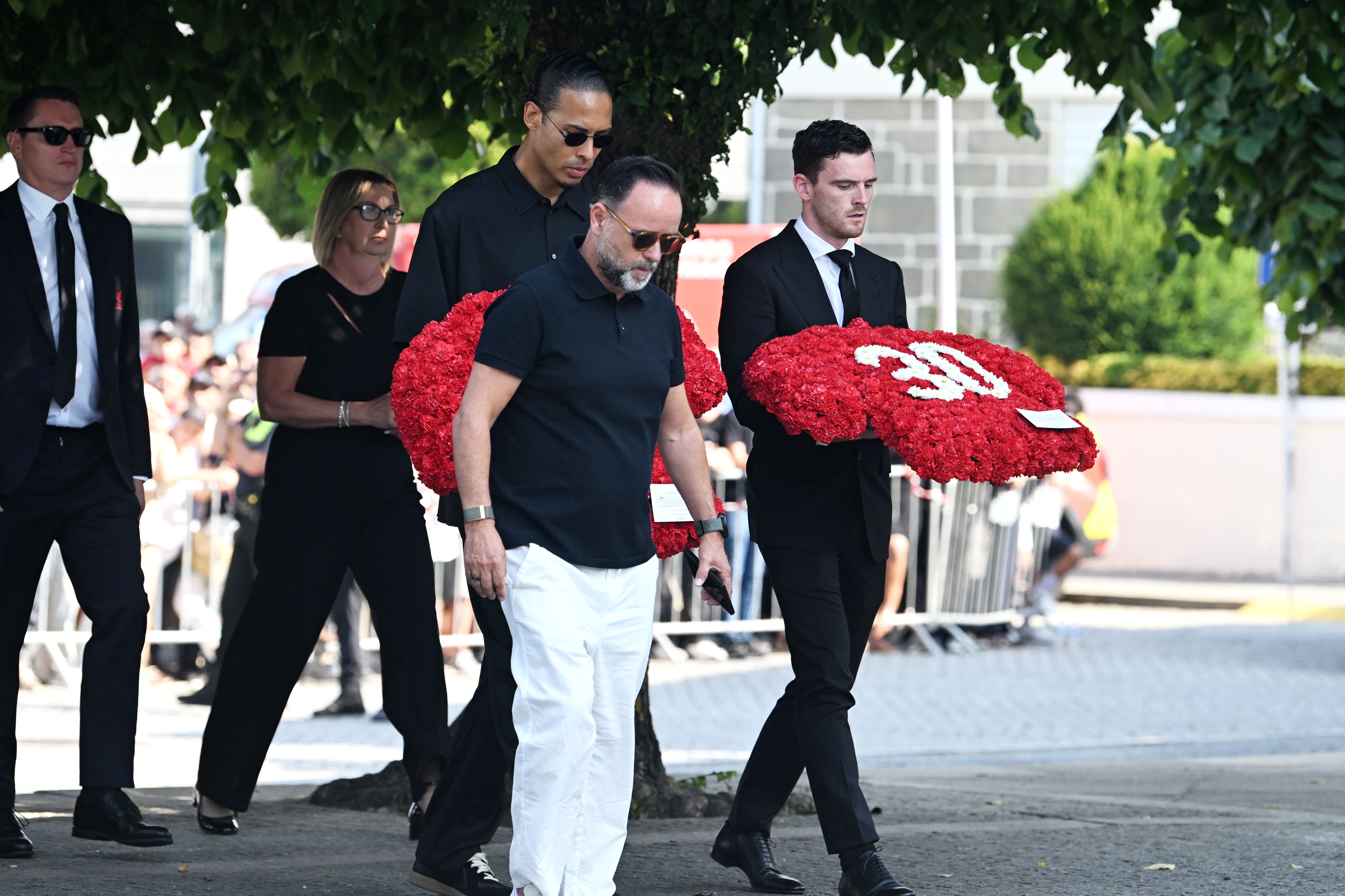 Liverpool’s Virgil Van Dijk and Andy Robertson arrive at the funeral of Diogo Jota and Andre Silva (PA)