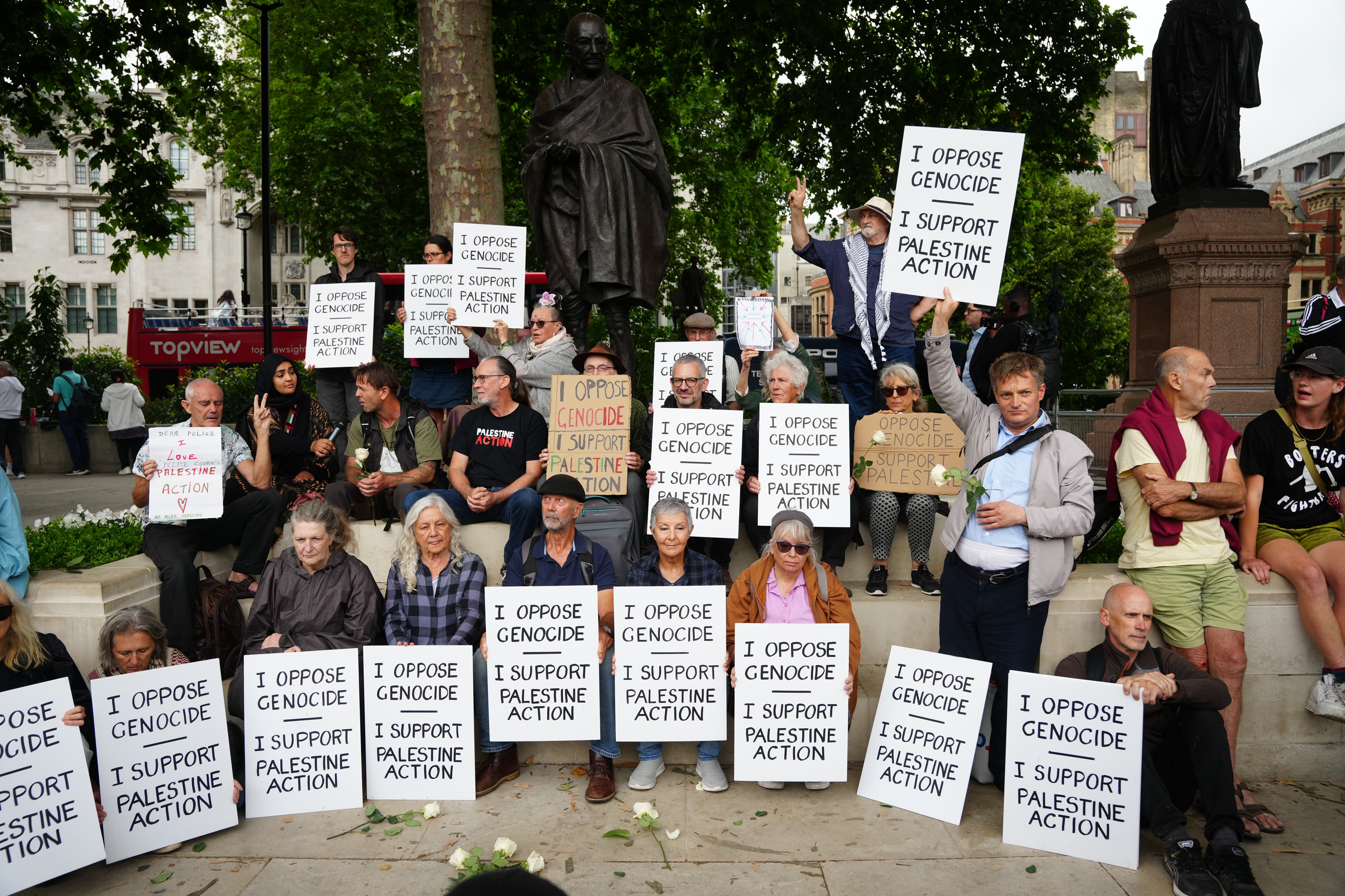People taking part in a protest in support of Palestine Action earlier on Saturday