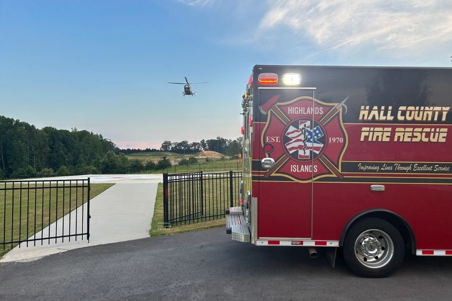 The 23‑foot cabin cruiser was being towed when it exploded into flames Friday on Landshark Cove.