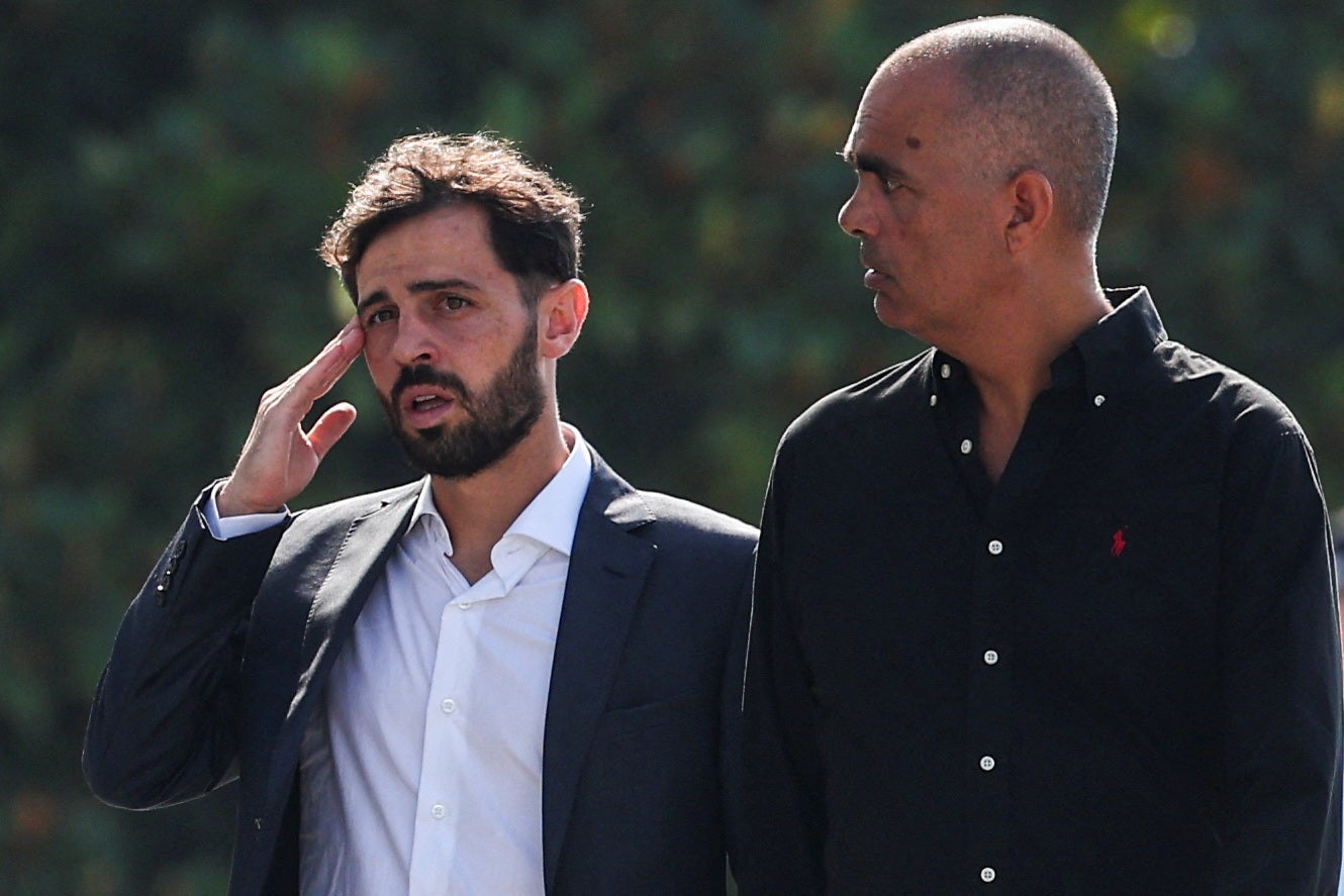 Rute Cardoso reacts as pallbearers carry her late husband Diogo Jota’s coffin