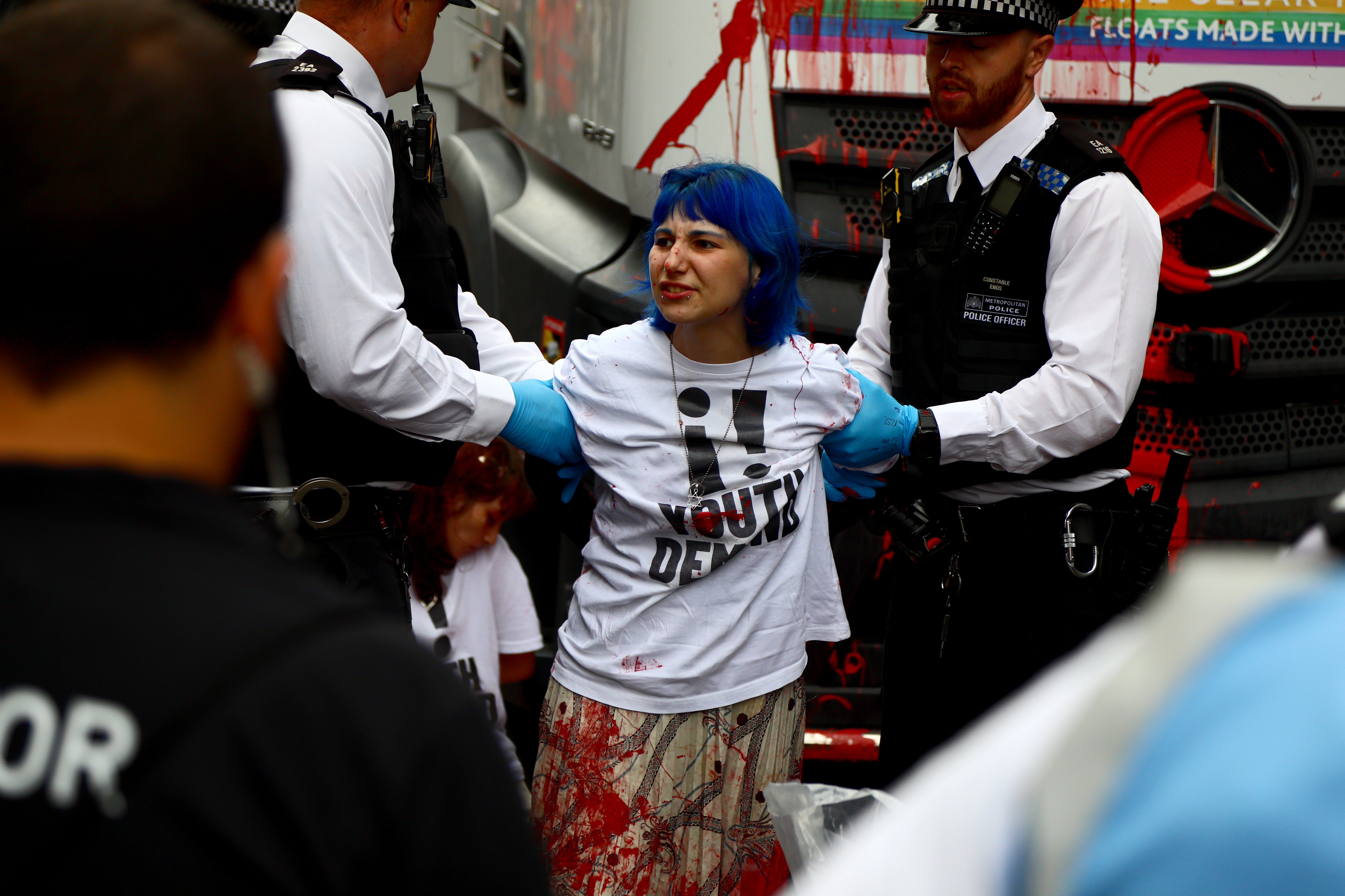 The Parade was delayed for about an hour while the group were removed, with five arrests made.
