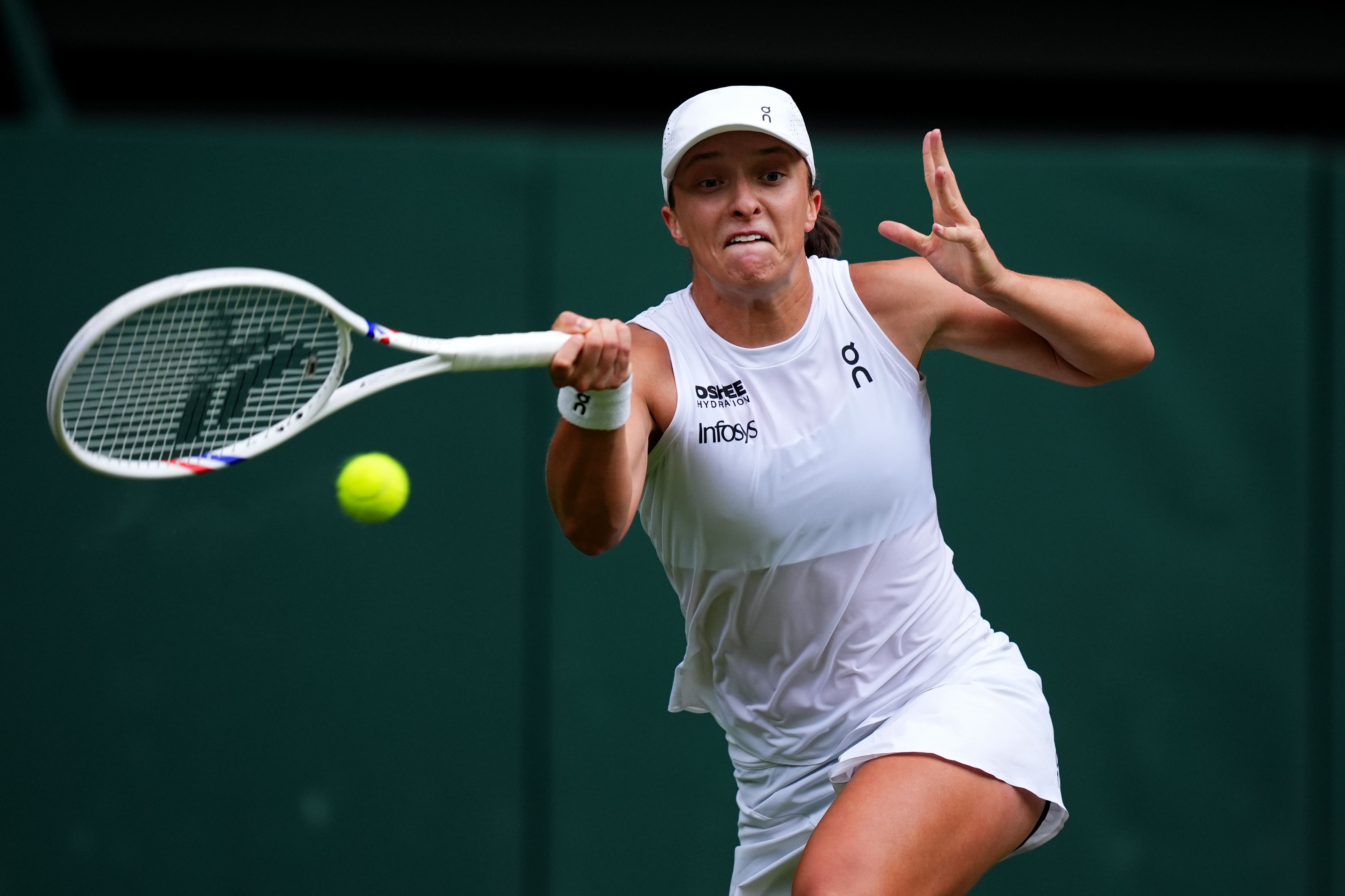 Iga Swiatek hits a forehand against Danielle Collins (Mike Egerton/PA)