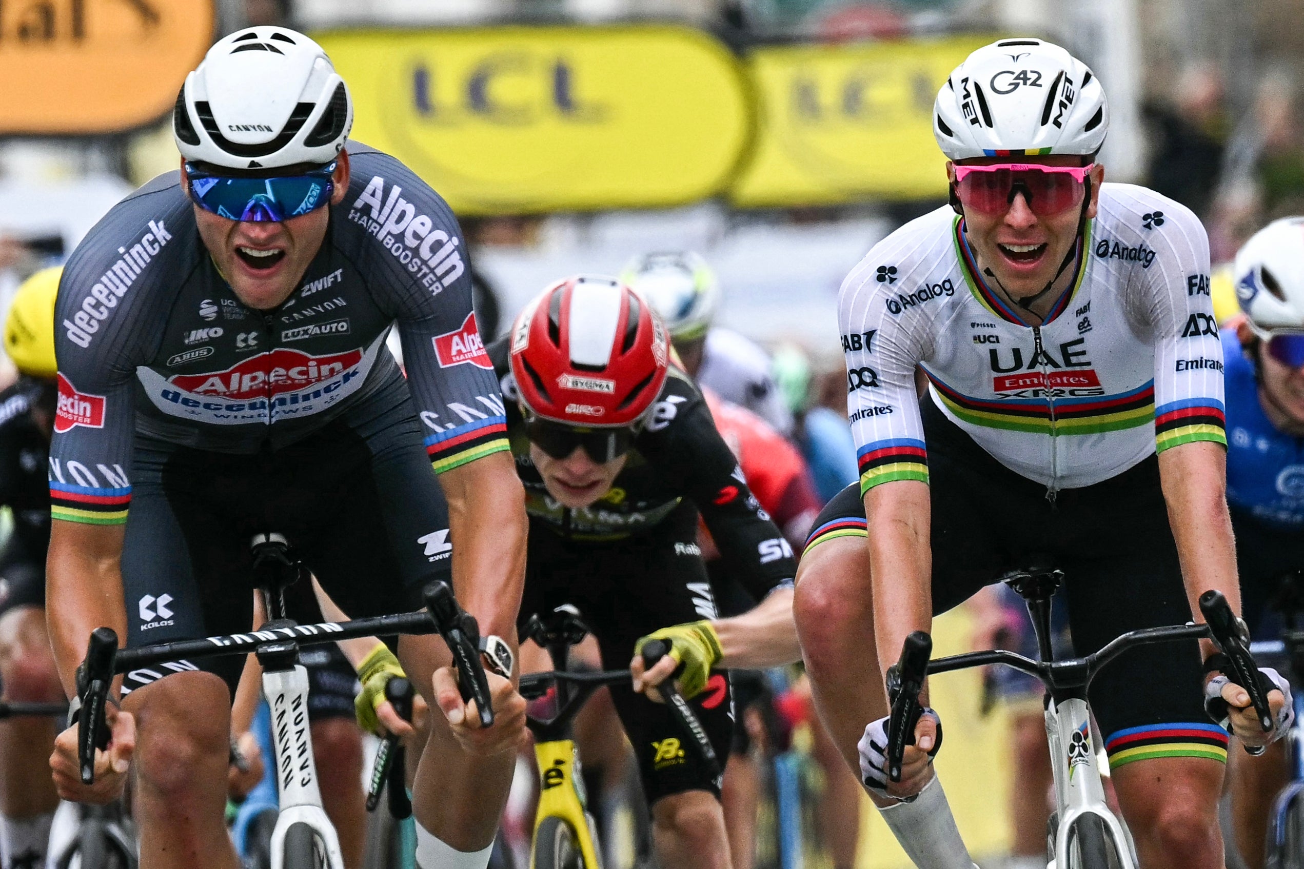 Mathieu van der Poel (left) beats Tadej Pogacar to the line on stage two of the Tour de France