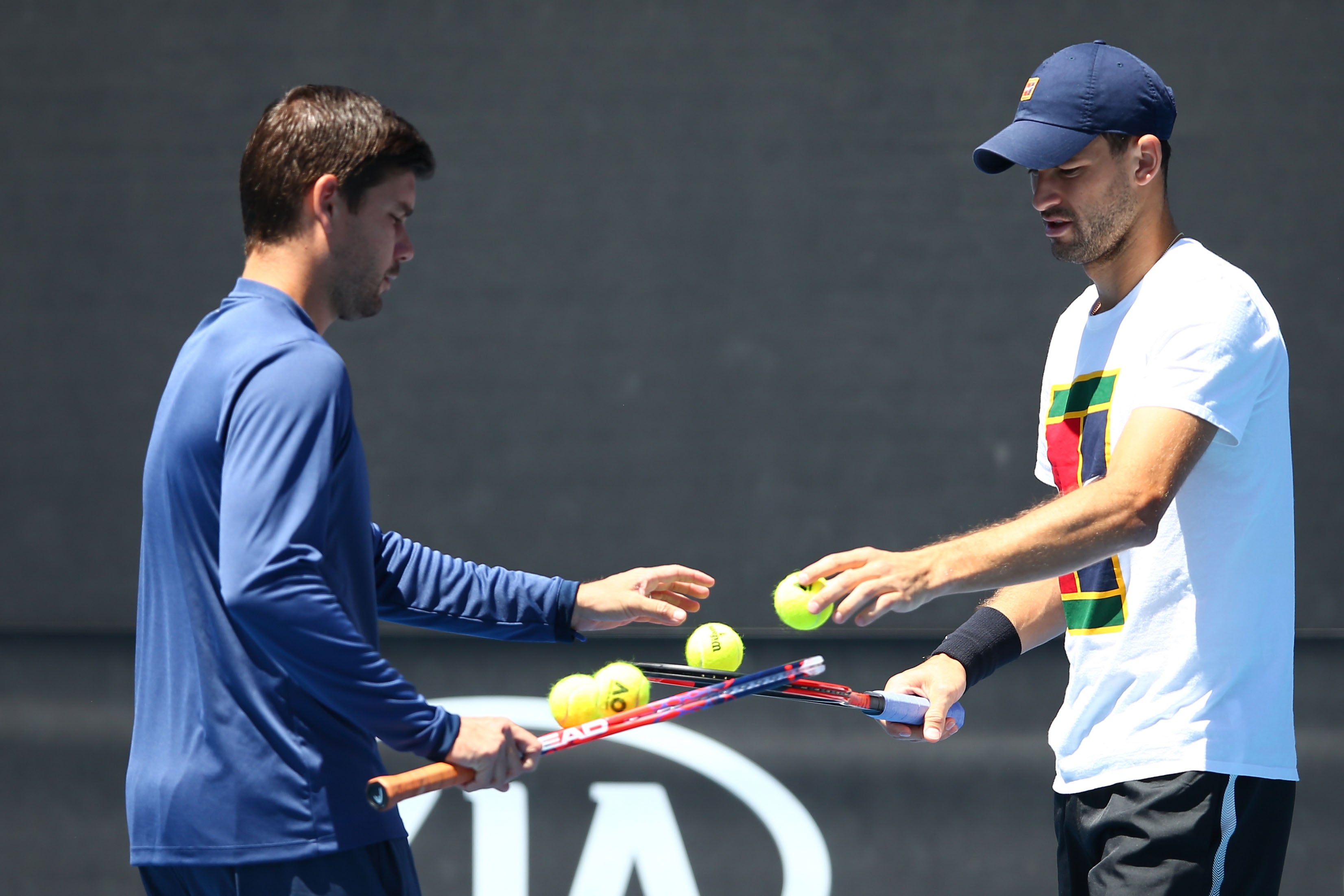 Dani Vallverdu, left, coaches Bulgaria’s Grigor Dimitrov