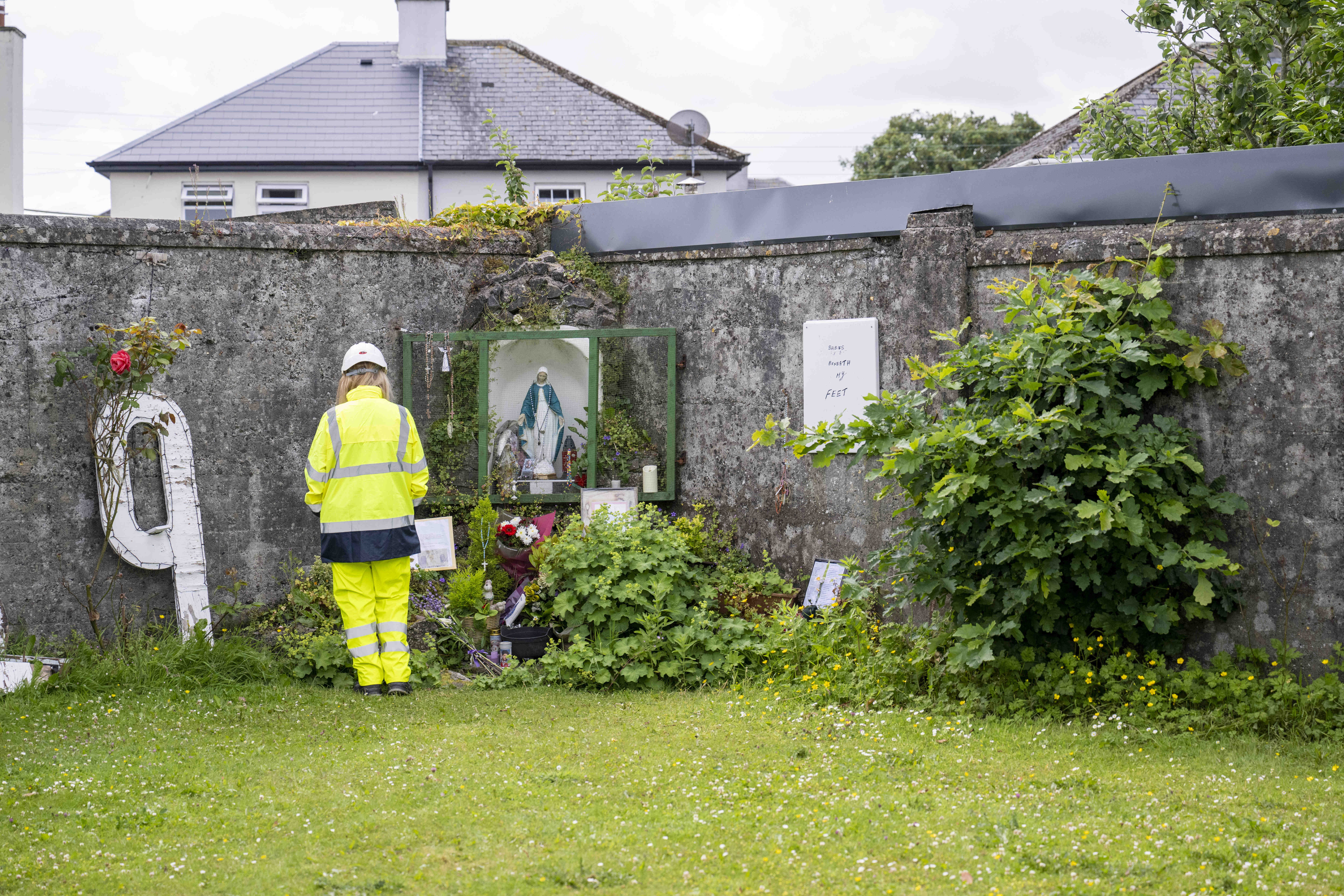 A worker at the site of the former Mother and Baby institution in Tuam, Co Galway, at the start of pre-excavation works