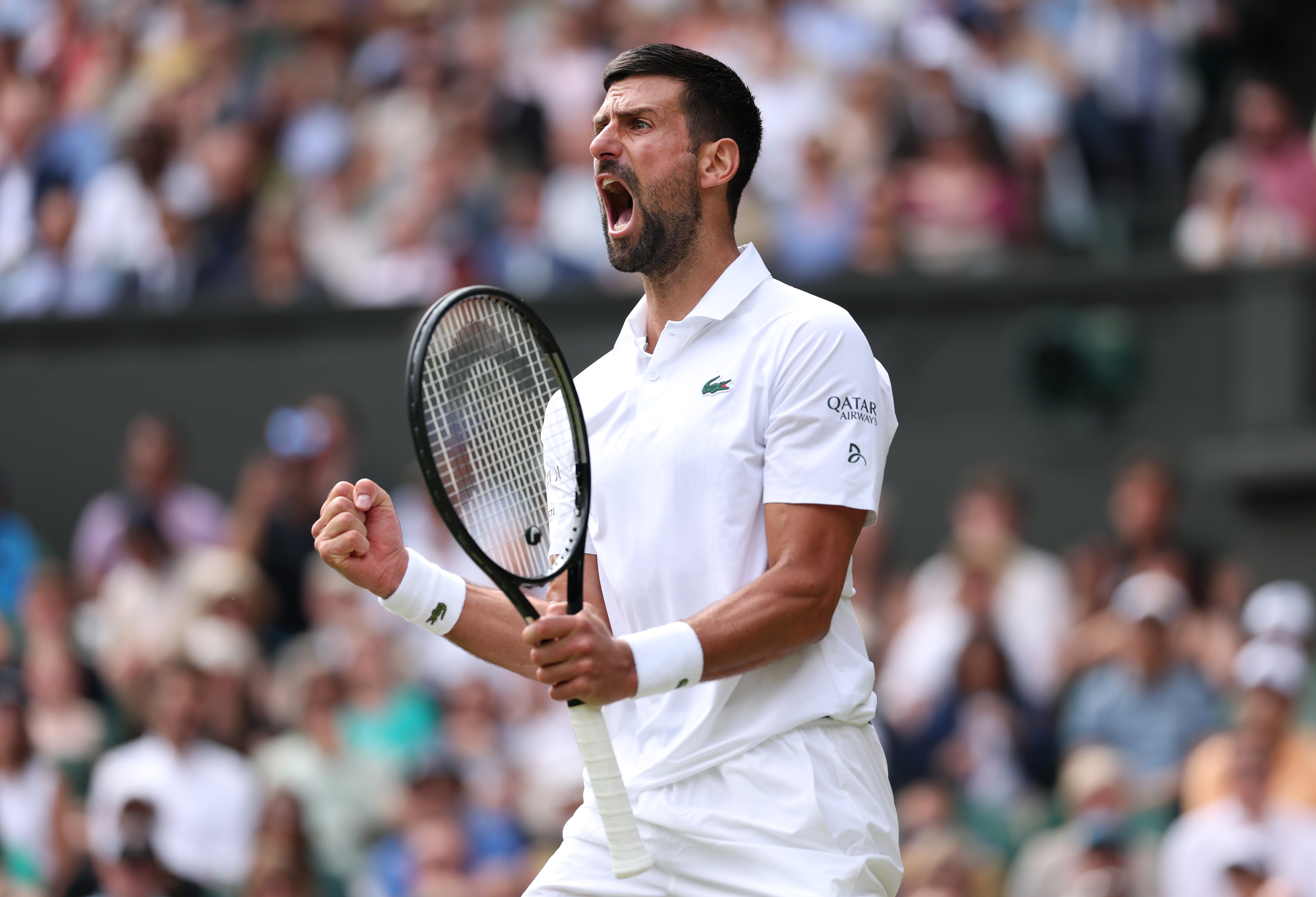 Djokovic celebrates during his closely fought contest with de Minaur