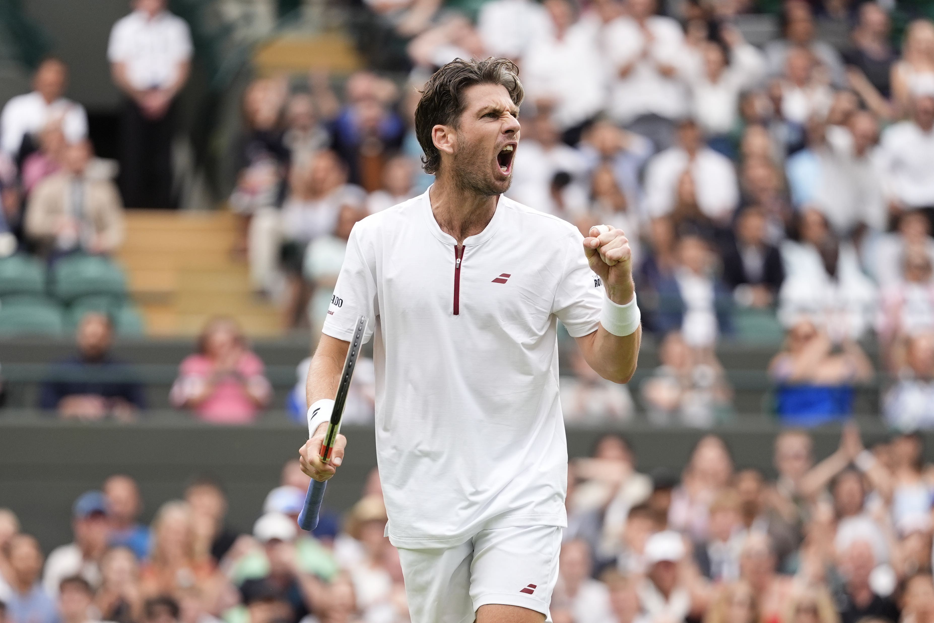 Cameron Norrie faces Carlos Alcaraz for a place in the Wimbledon semi-finals (Jordan Pettitt/PA)