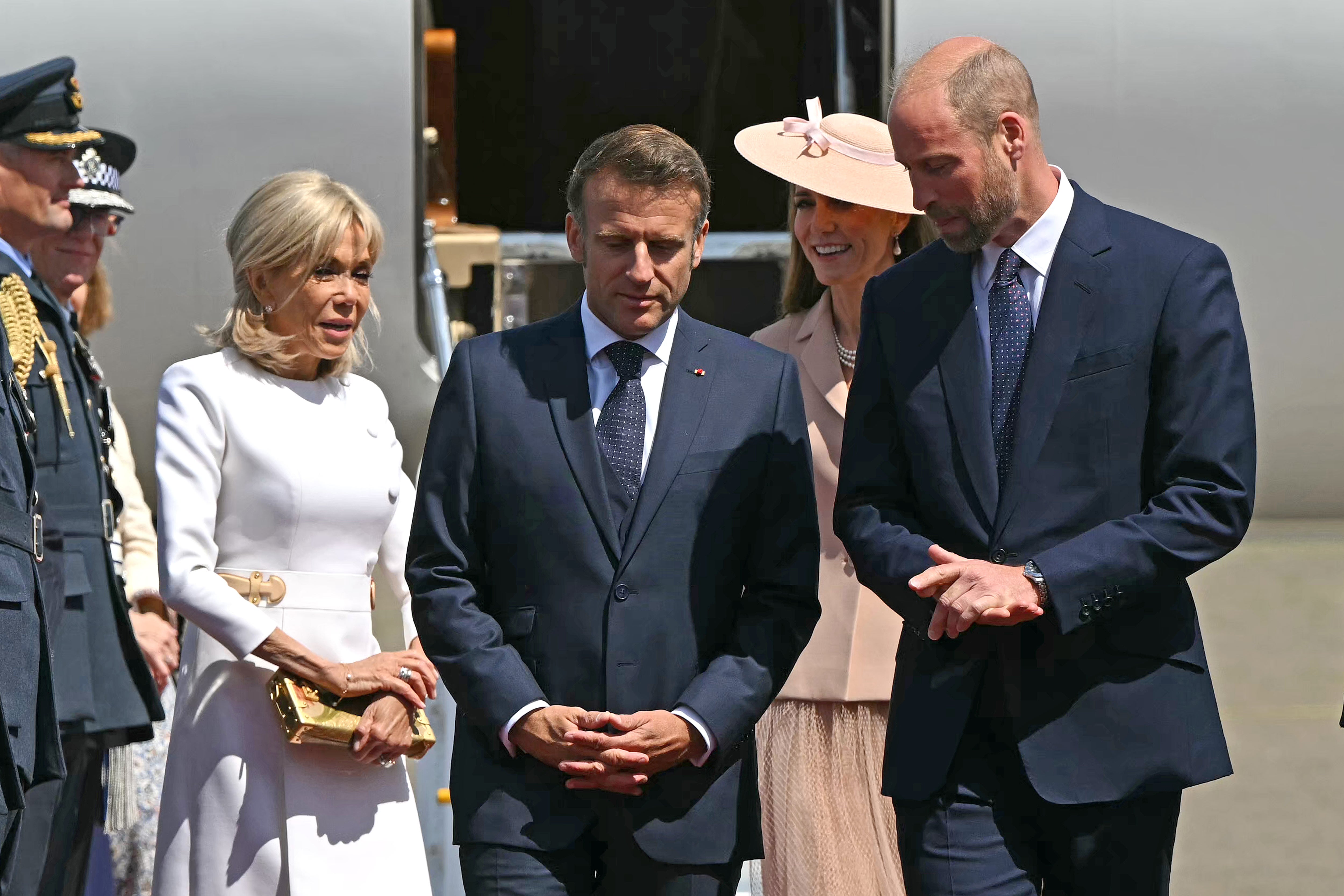 <p>France's President Emmanuel Macron and his wife Brigitte Macron disembark from the plane upon their arrival at Noi Bai International Airport in Hanoi</p>
