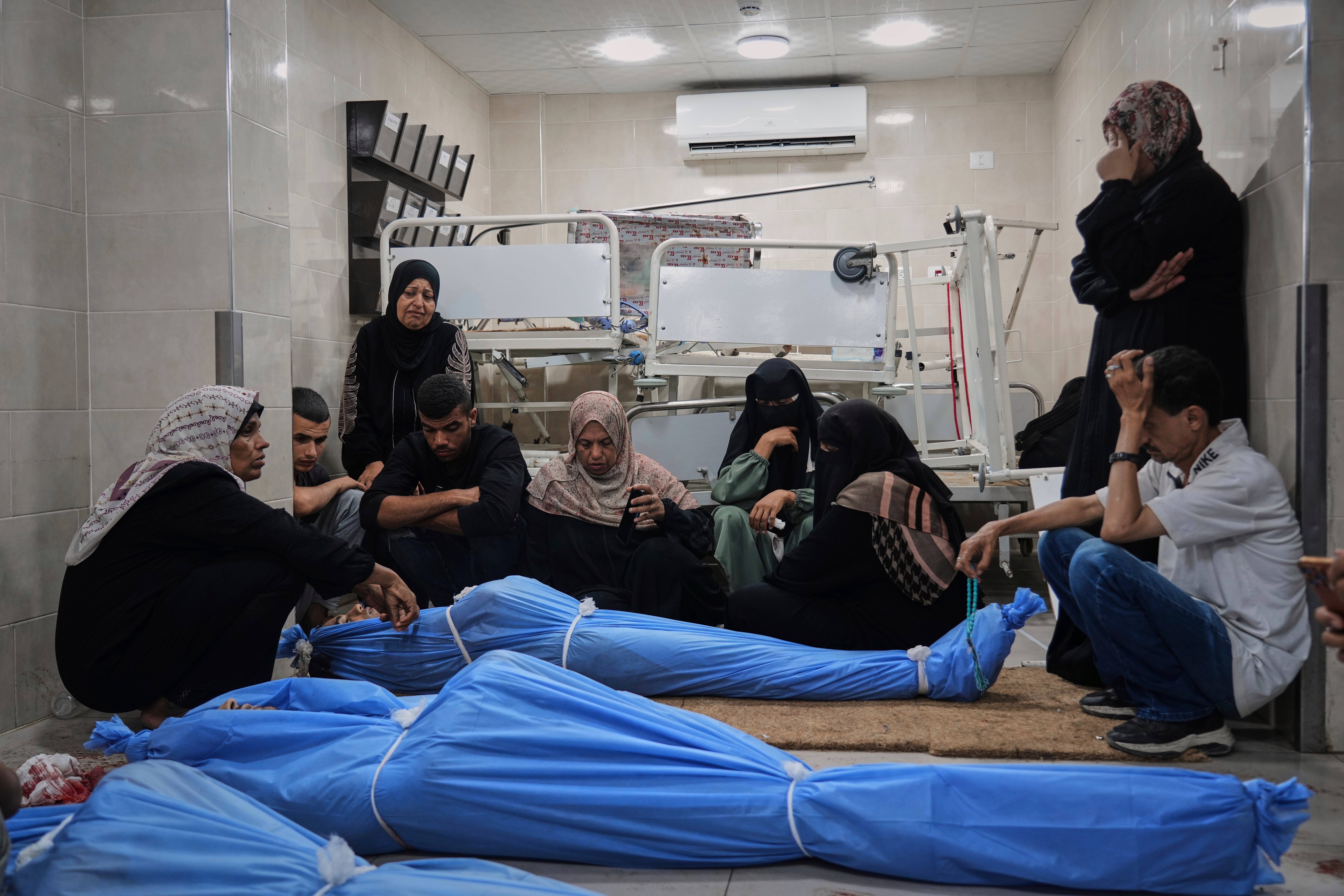 Mourners attend the funeral of victims who were killed in an Israeli bombardment of Gaza Strip on Wednesday
